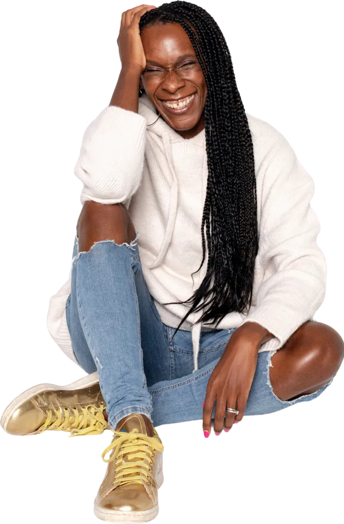 Suzy Ashworth sitting and laughing