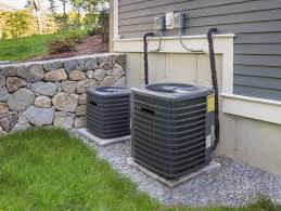 pic of a HVAC unit outside a house