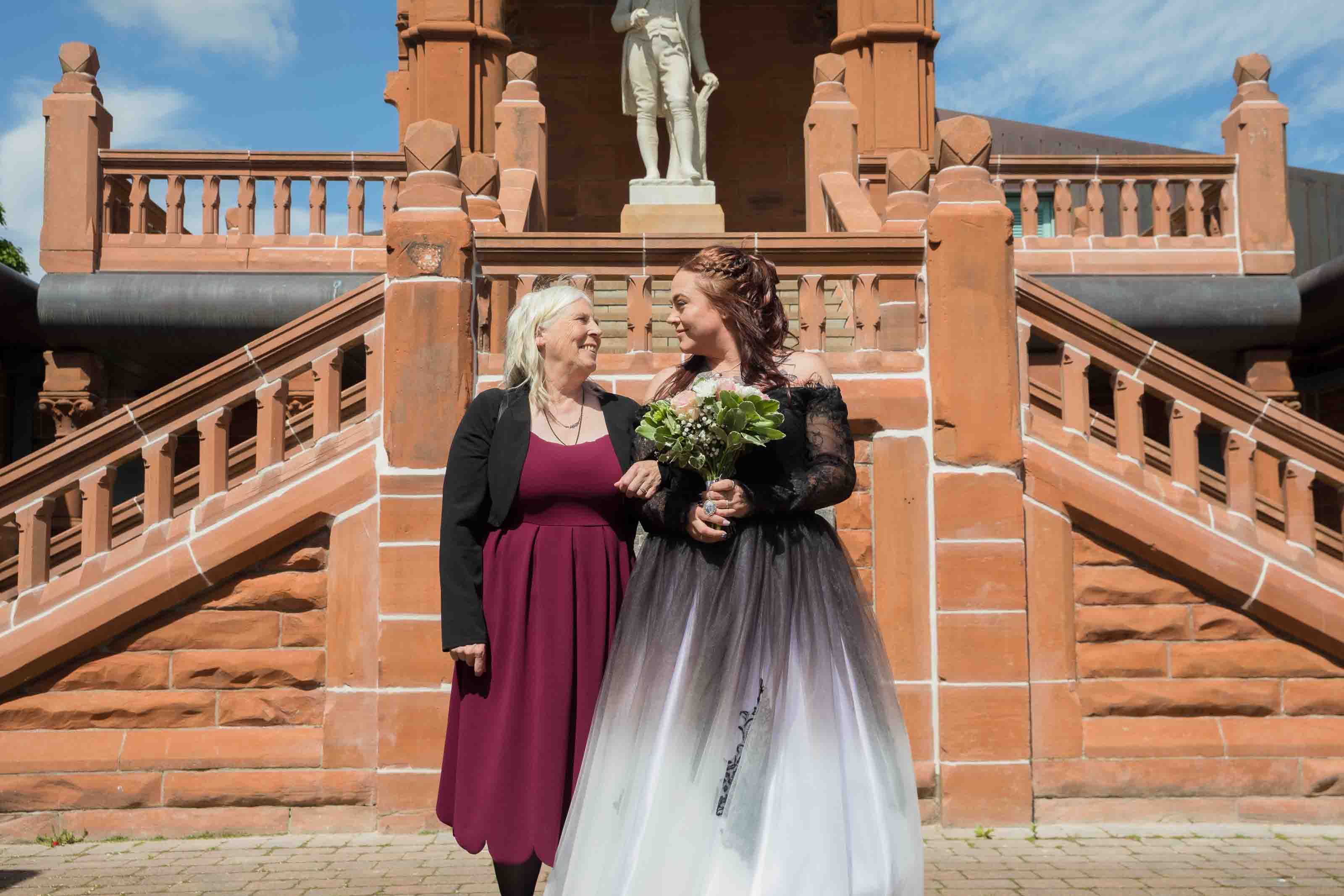 Wedding portraits at The Burns Monument in Ayrshire, mother of the bride and bride looking at one another