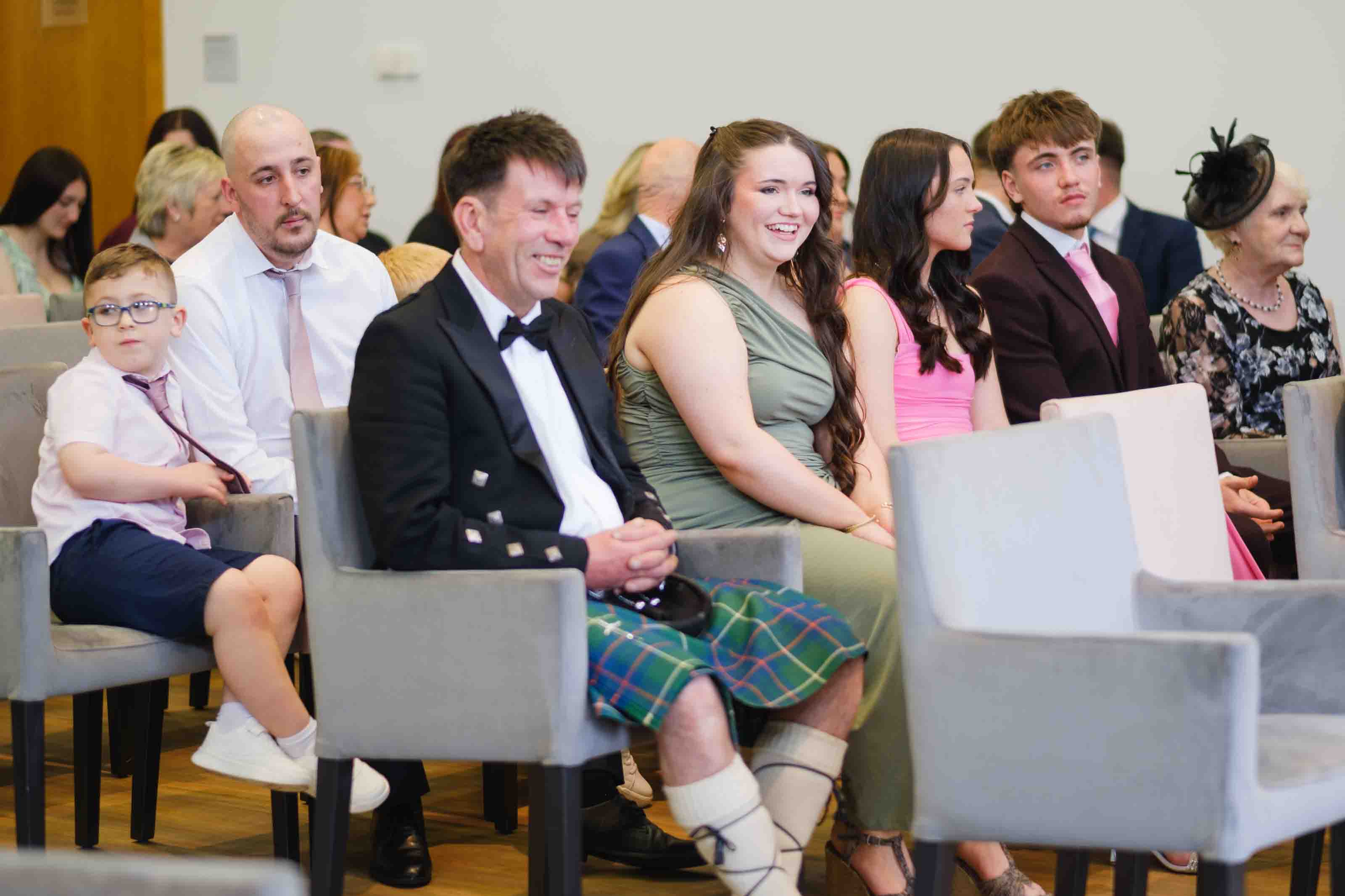 Wedding guests watching ceremony at The Burns Monument, Kilmarnock