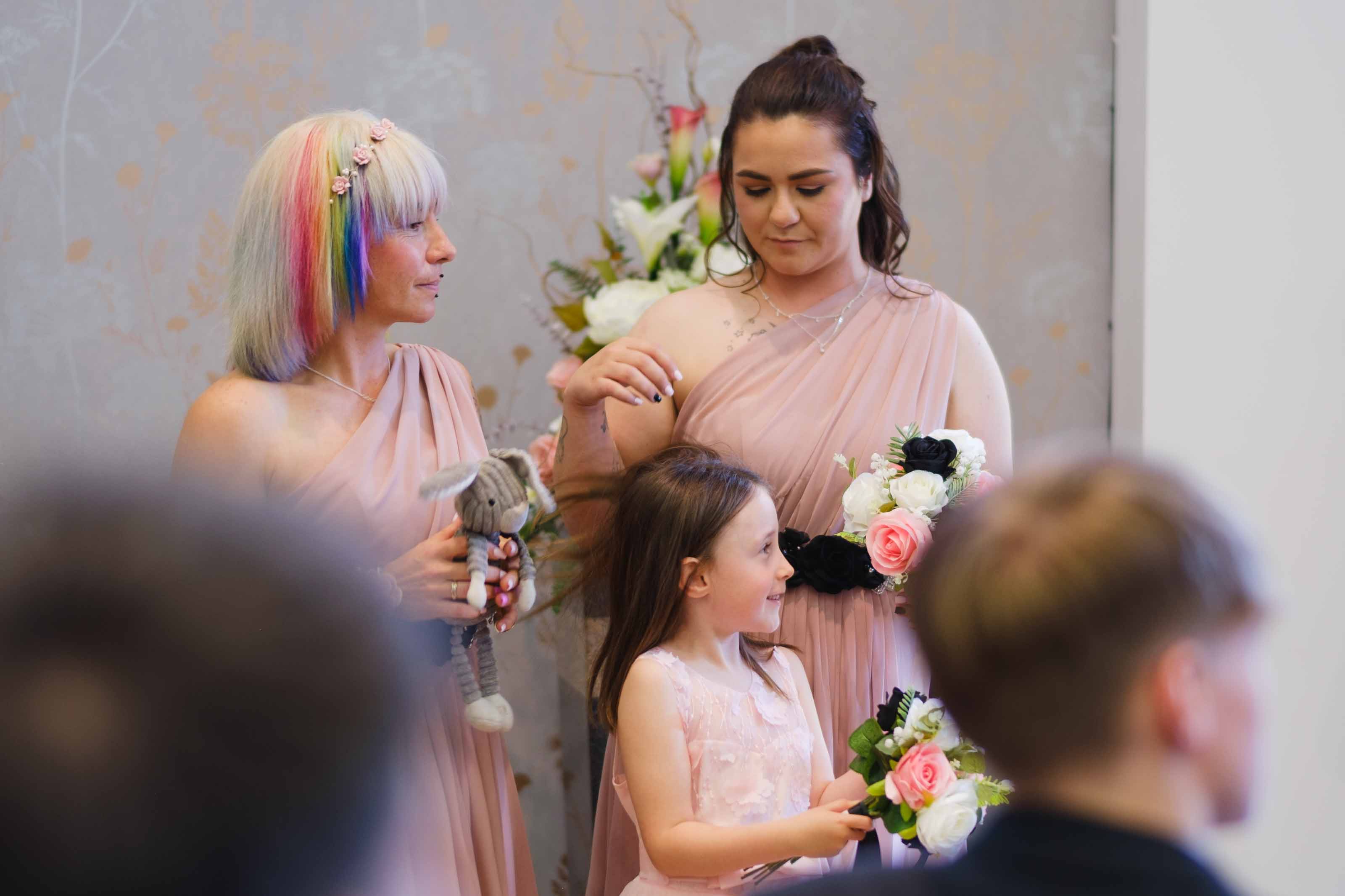 Wedding ceremony at The Burns Monument in Ayrshire with bridesmaids and daughter of the couple