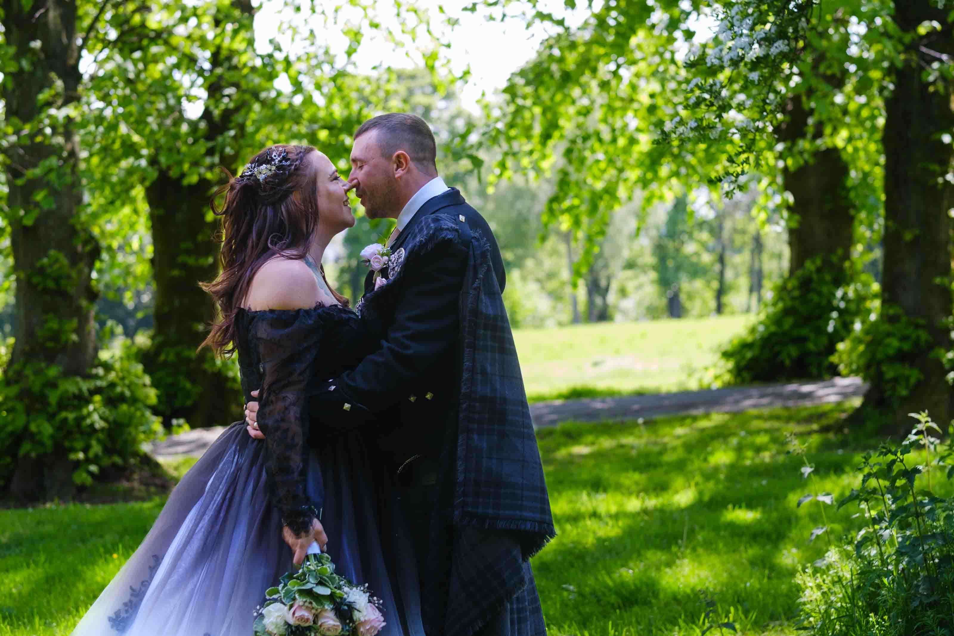 Newly married couple outside The Burns Monument, Ayrshire 