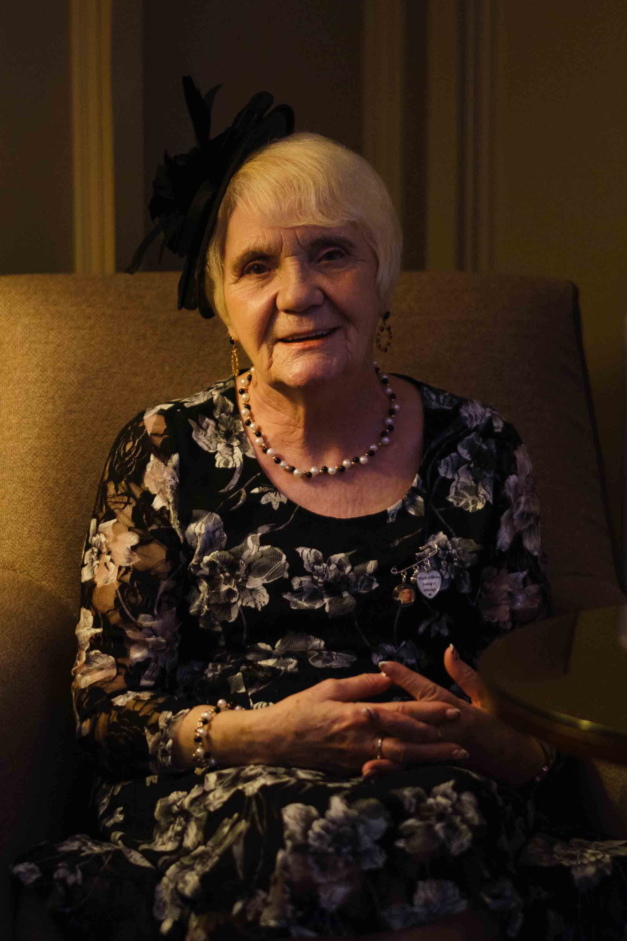 Guests celebrating at Dumfries Arms Hotel wedding, portrait of grooms grandmother