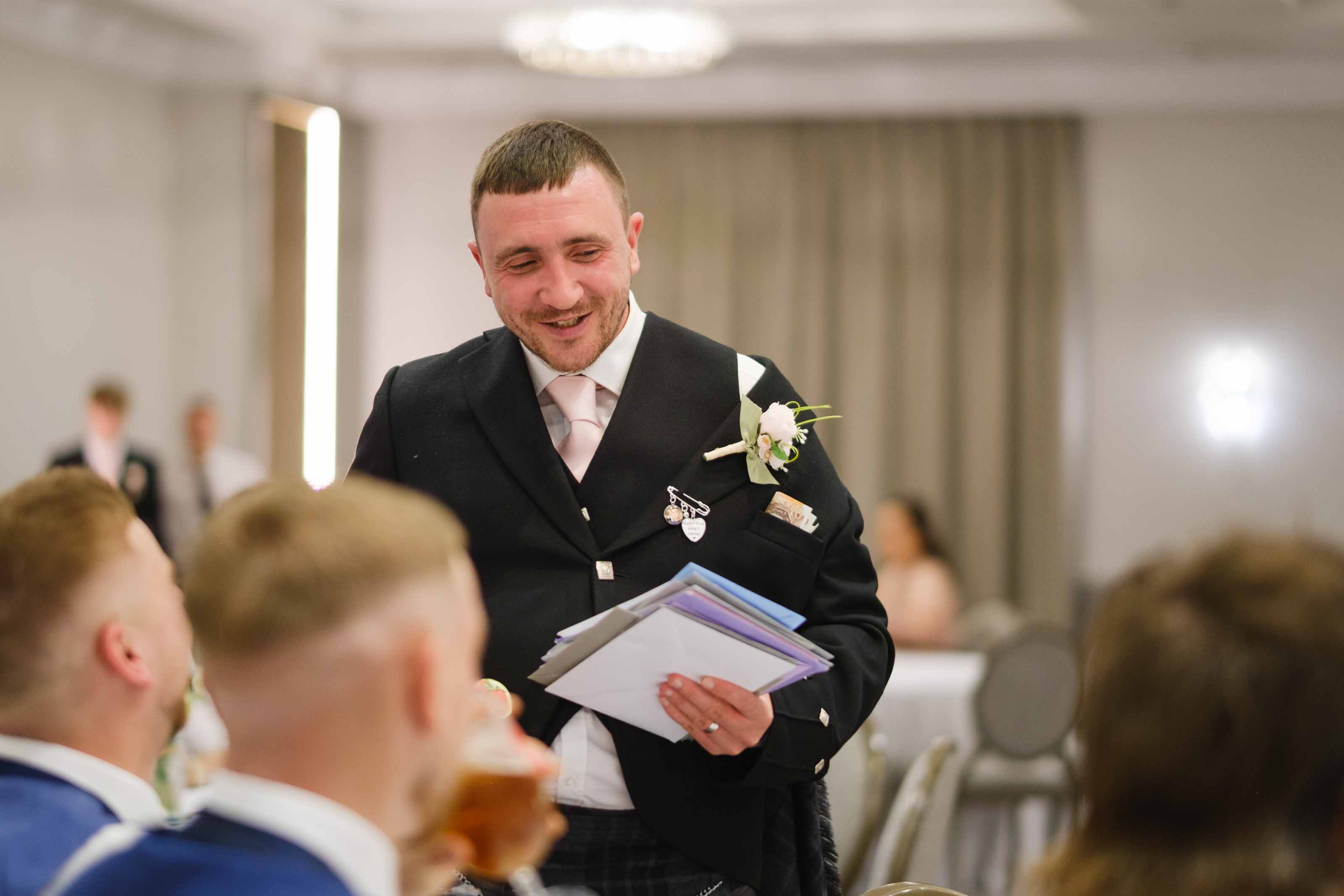 Guests celebrating at Dumfries Arms Hotel wedding