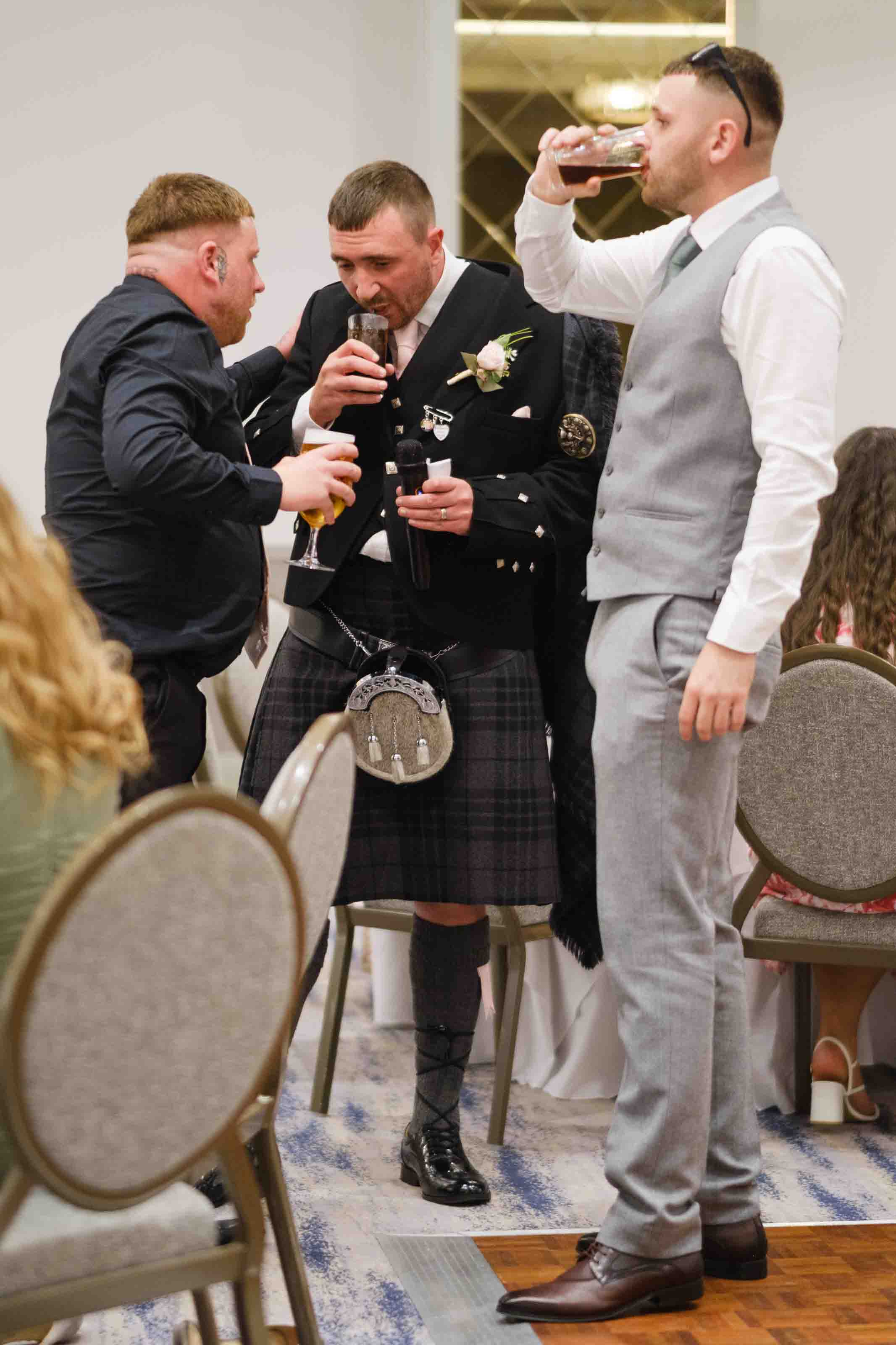 Groom after wedding speeches at Dumfries Arms Hotel