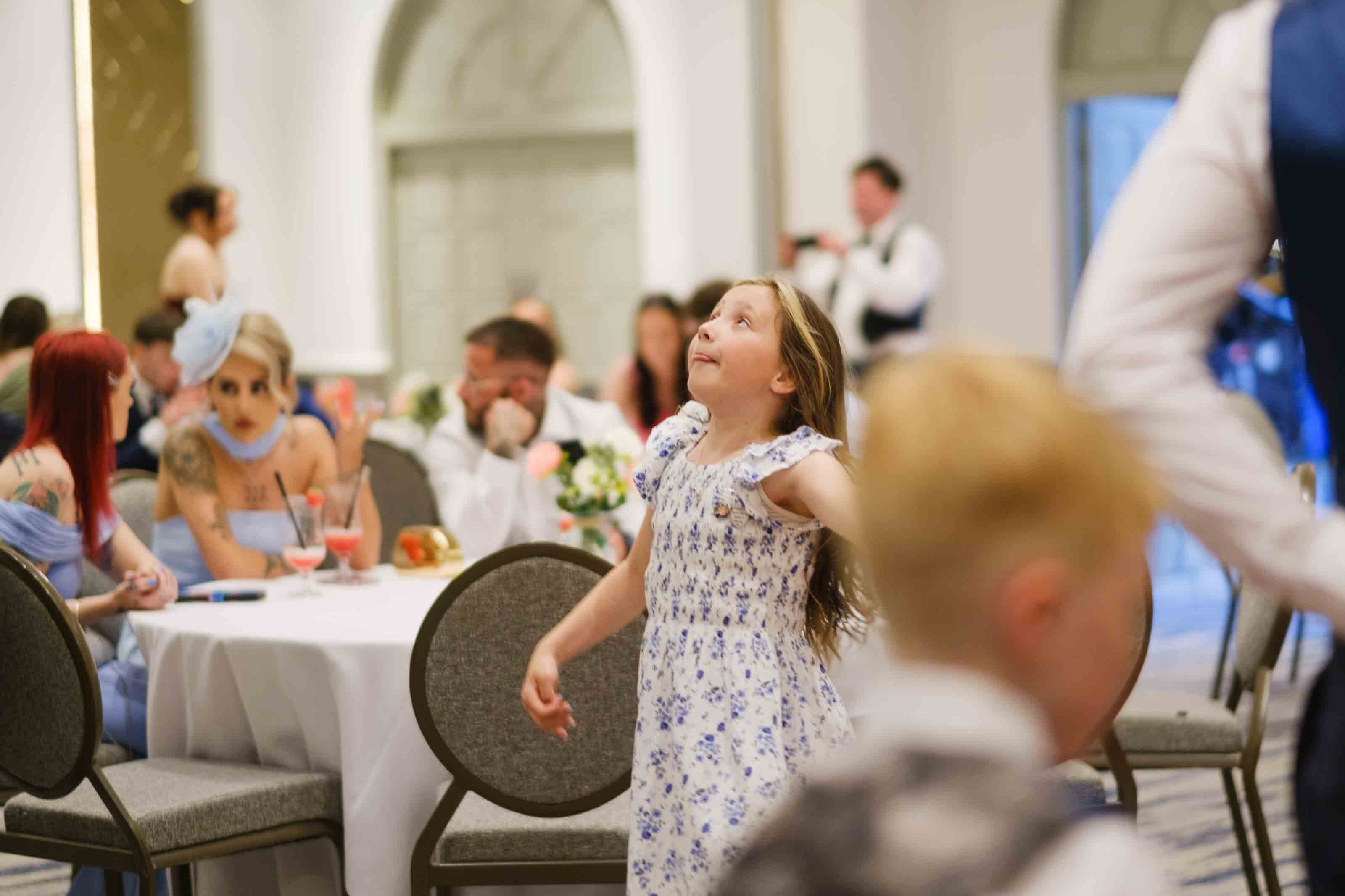 Kids playing games during Scottish wedding reception