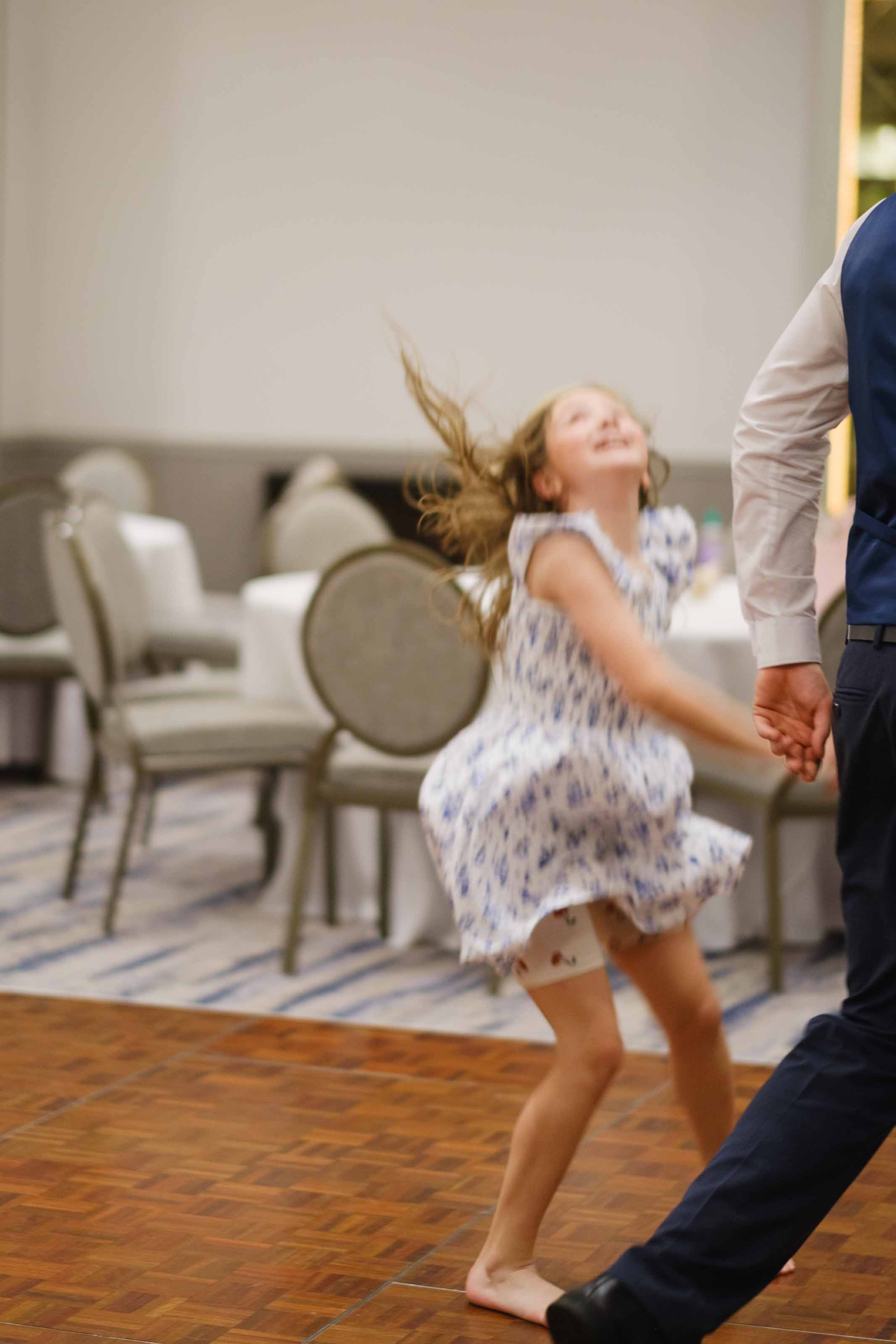 Kids playing games during Scottish wedding reception
