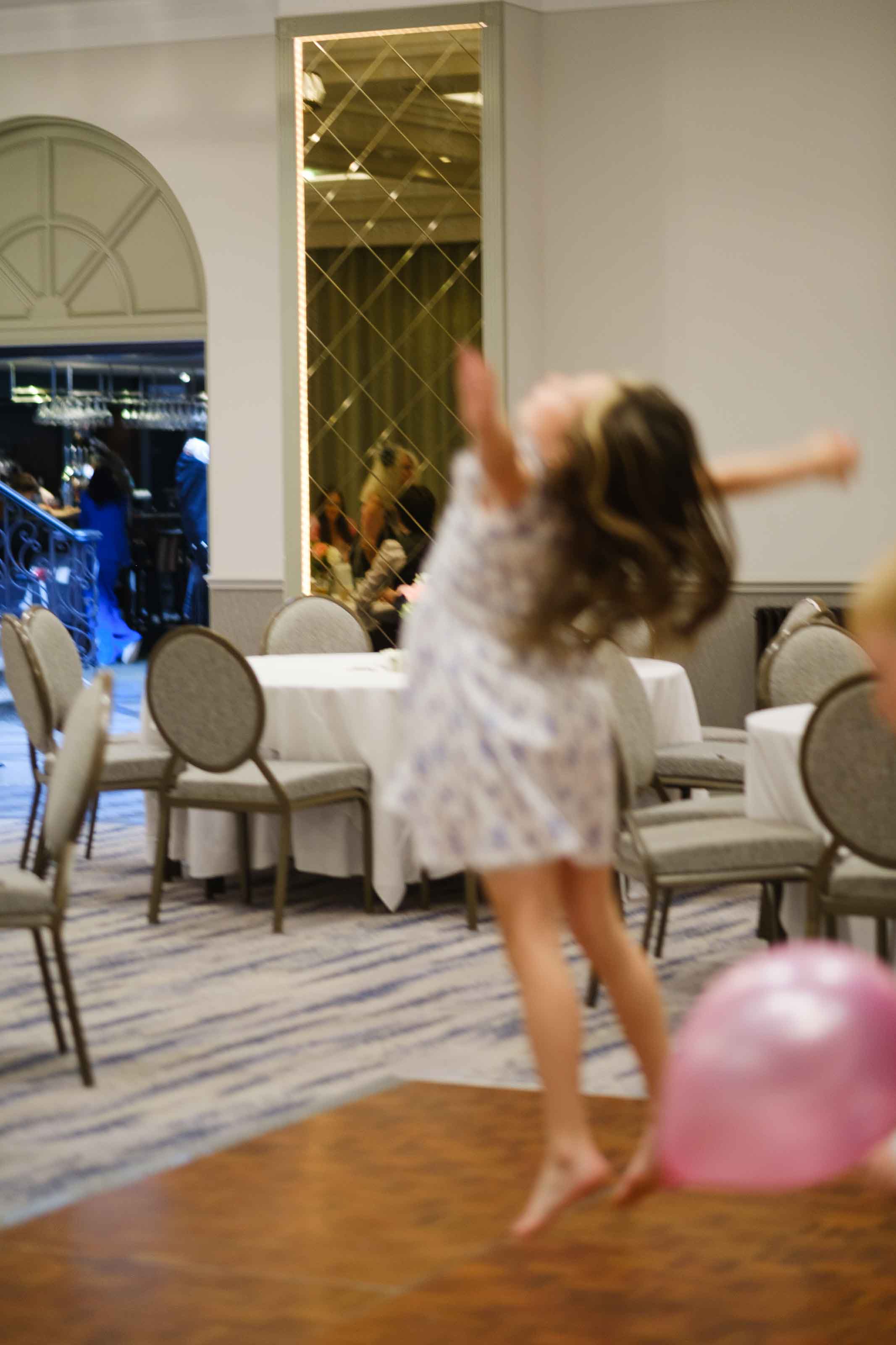Kids playing games during Scottish wedding reception
