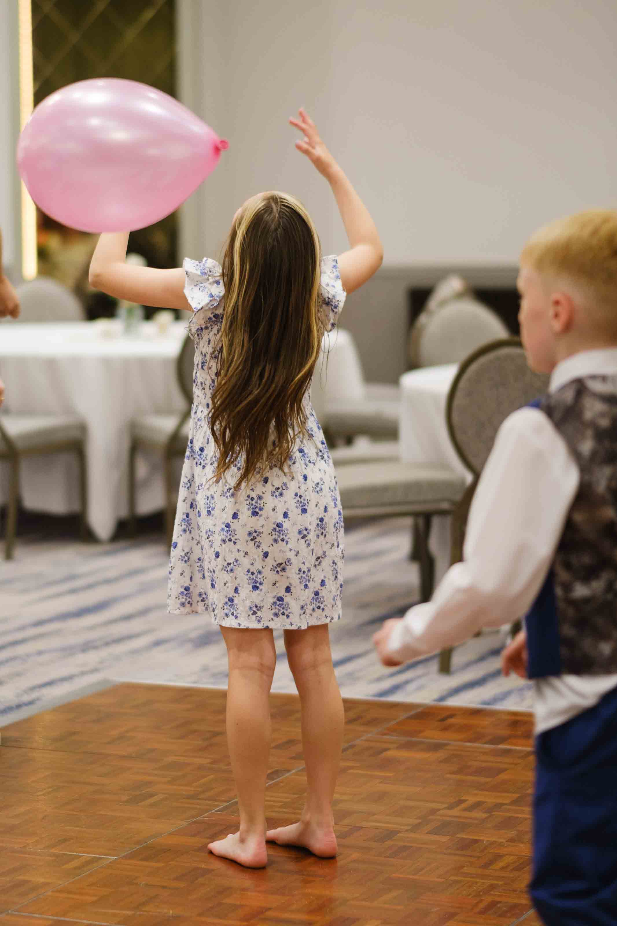 Kids playing games during Scottish wedding reception