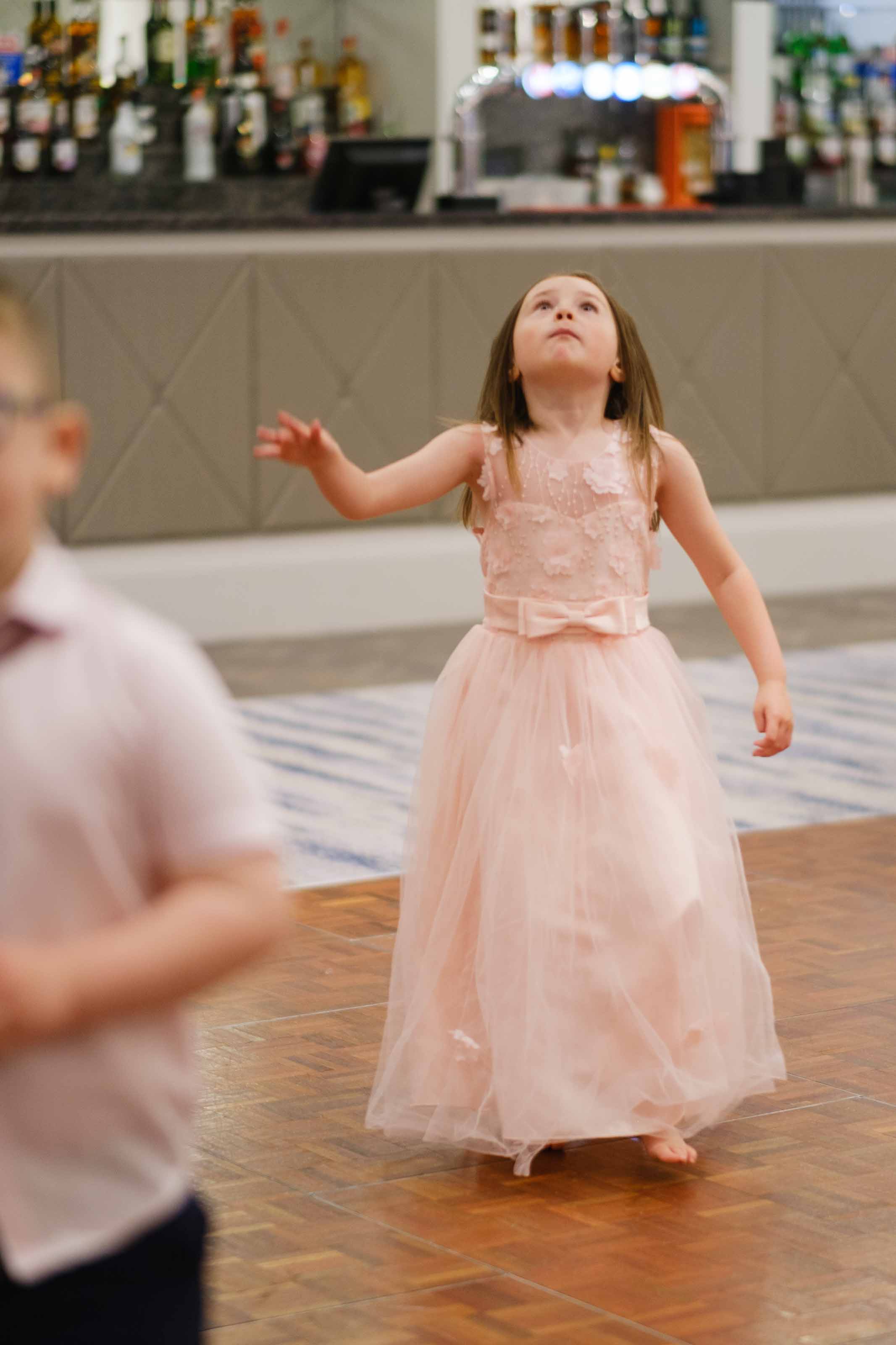 Documentary wedding photography of children playing, Ayrshire wedding reception