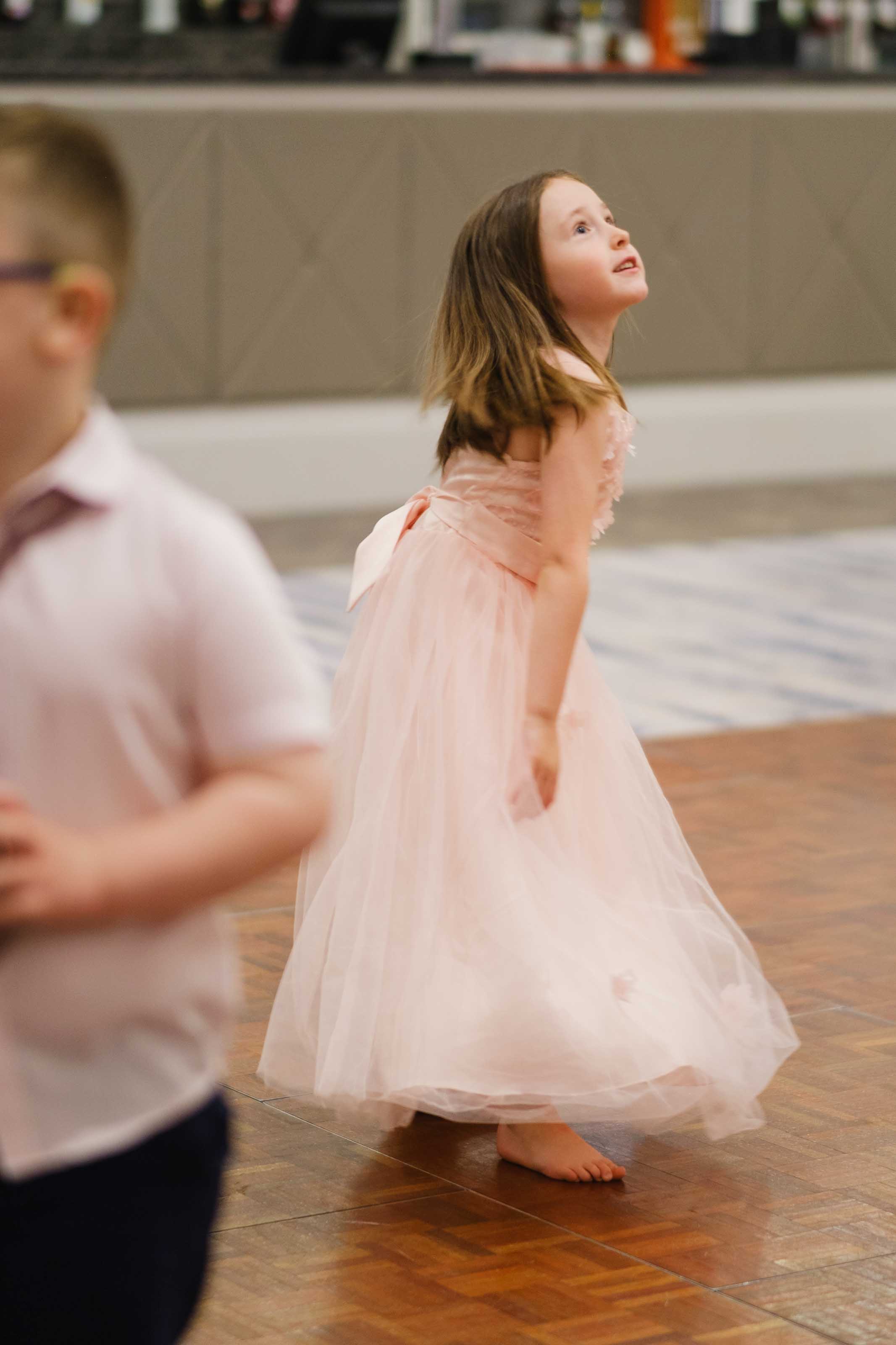 Documentary wedding photography of children playing, Ayrshire wedding reception