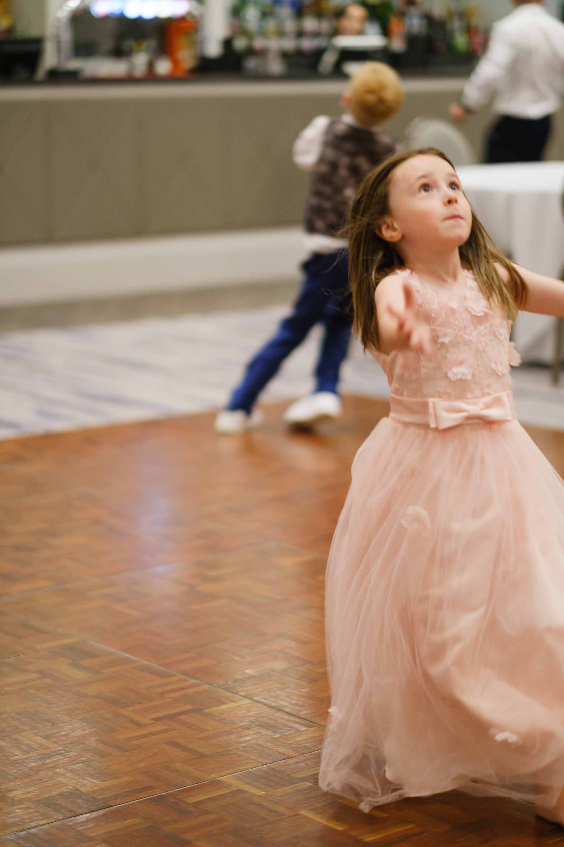 Documentary wedding photography of children playing, Ayrshire wedding reception