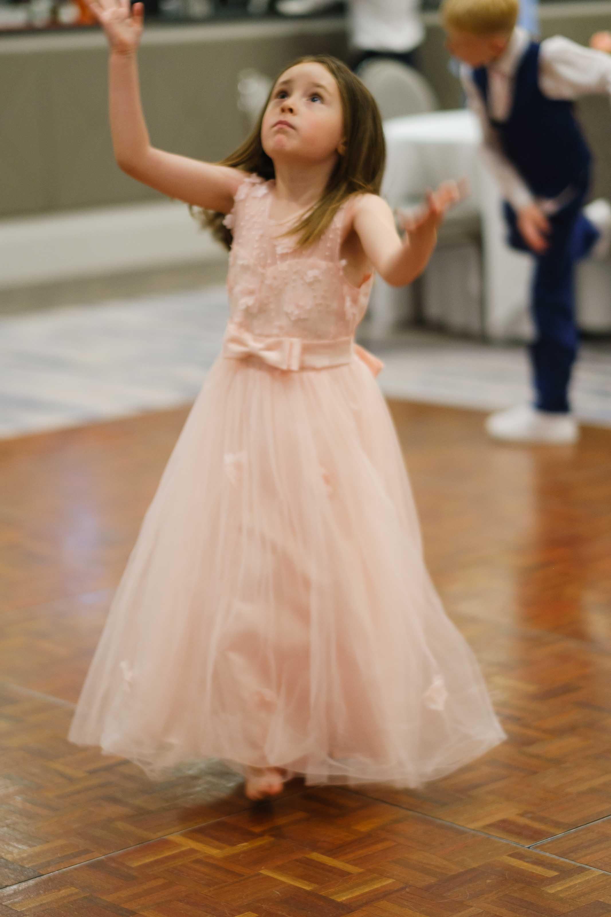 Documentary wedding photography of children playing, Ayrshire wedding reception
