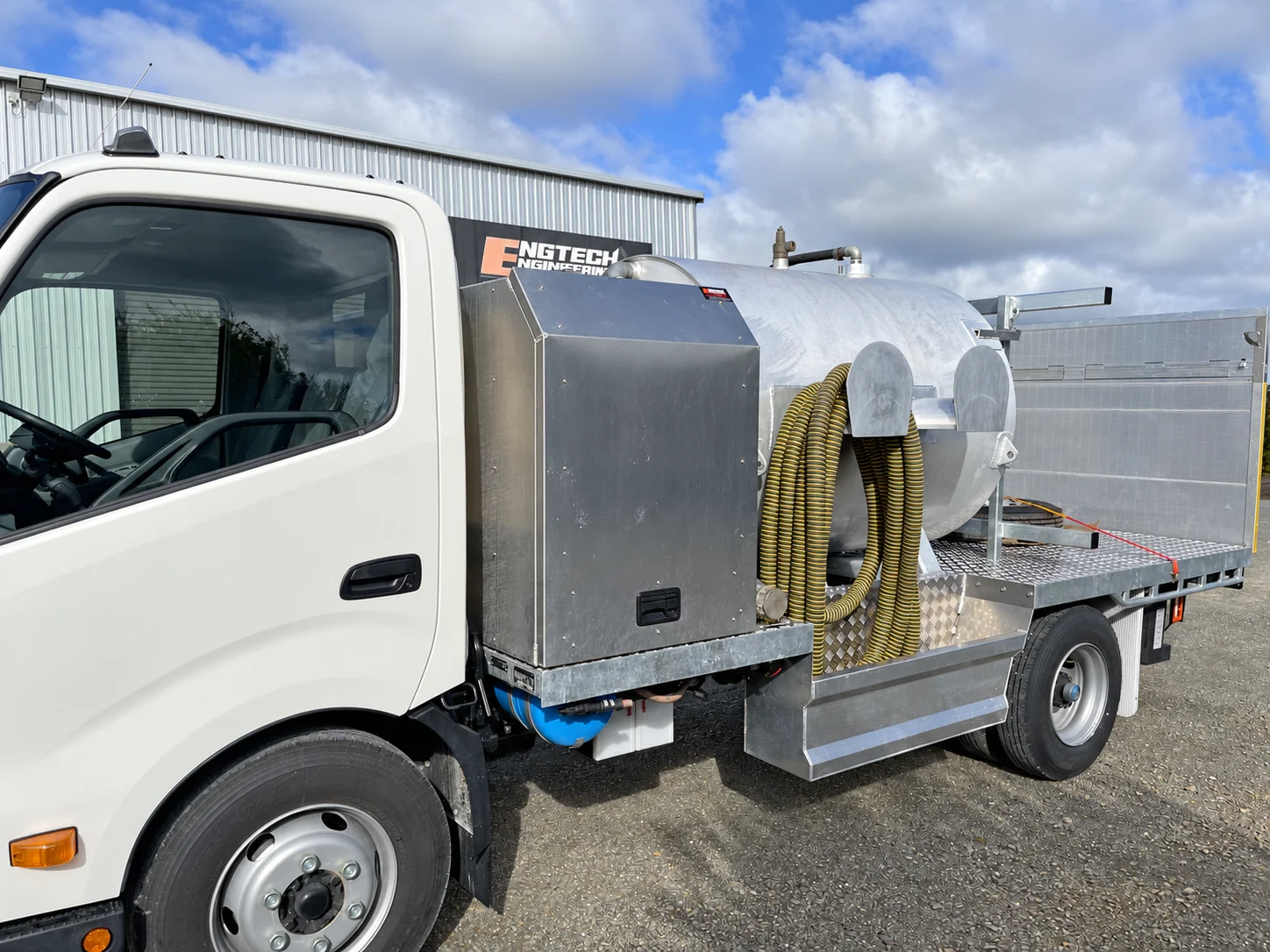 Truck body with open compartments