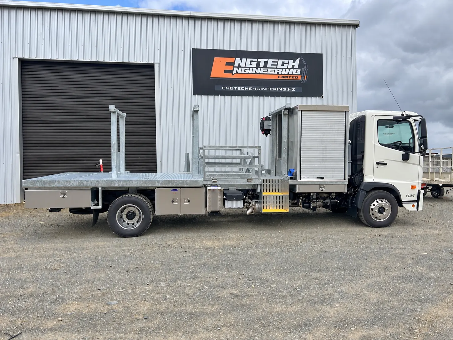 Truck body standing outside a workshop