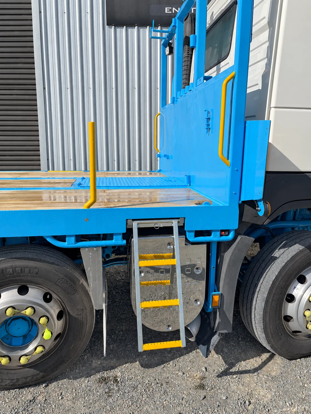 Blue truck body built on a chassis