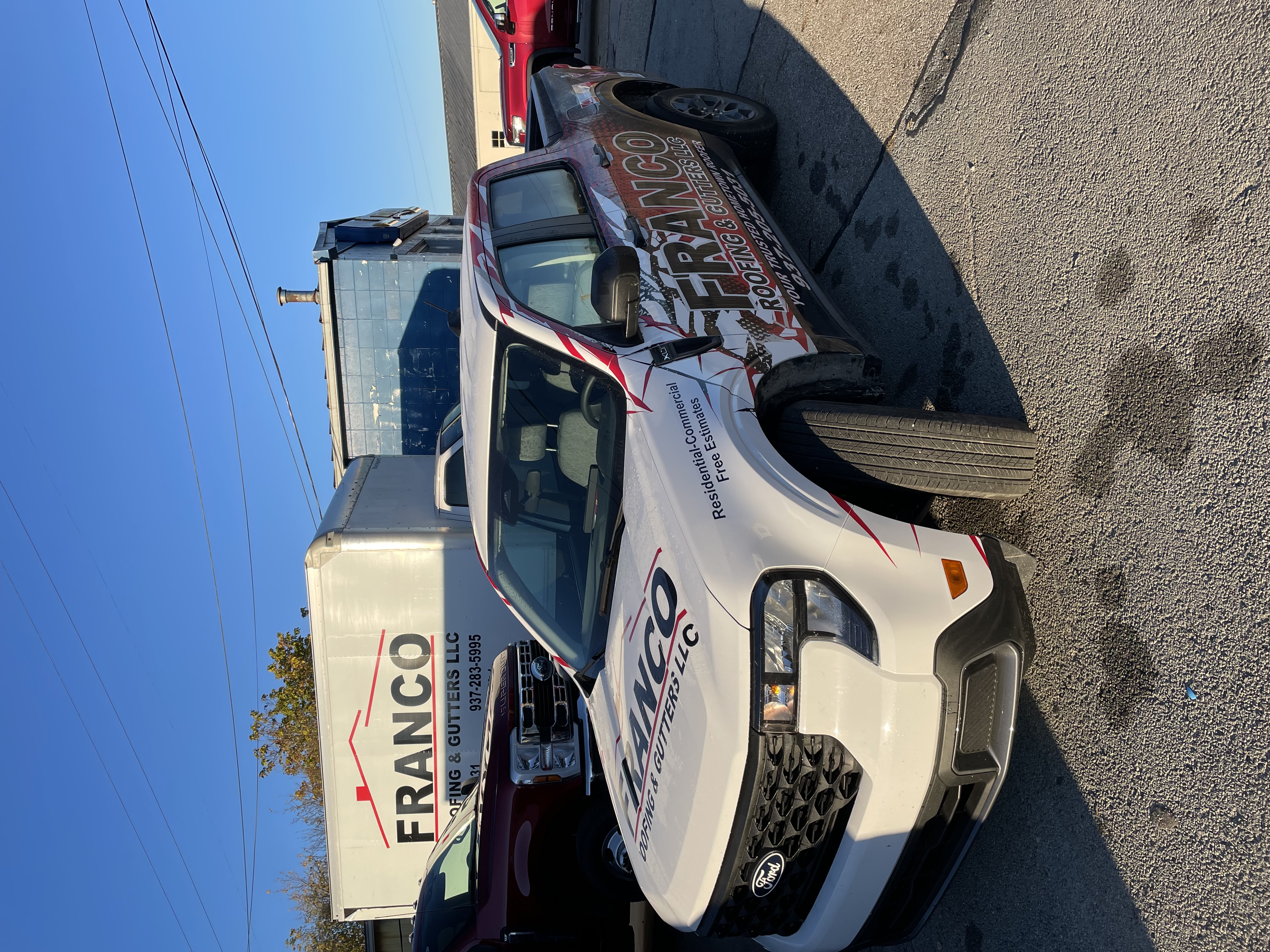Franco Roofing and Gutters branded truck