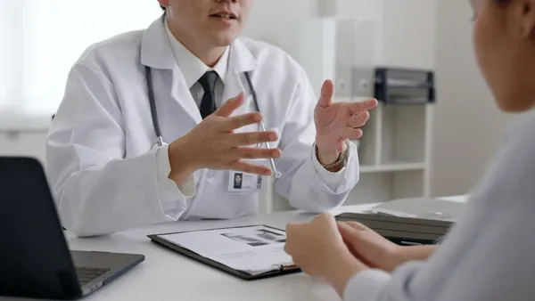 Canadian pharmacist preparing a patient prescription