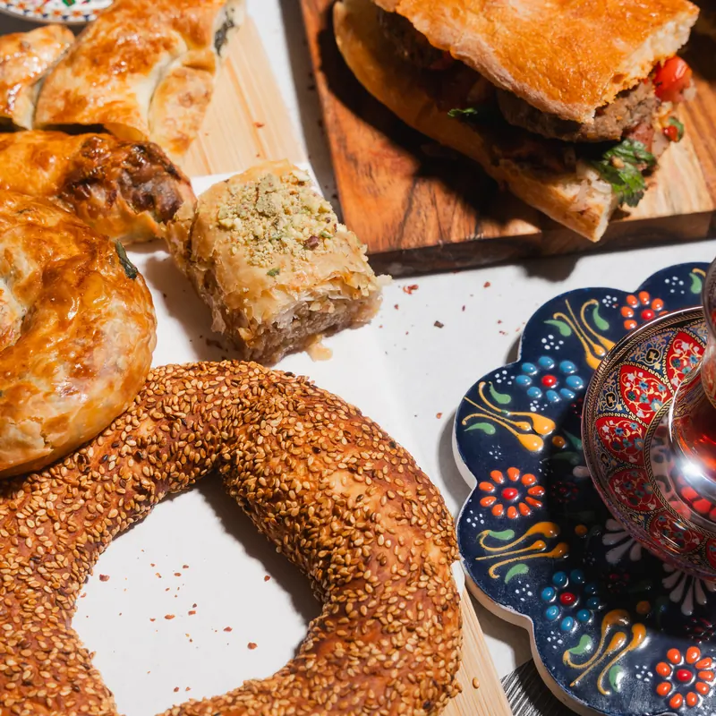Simit, baklava, börek and Turkish sandwiches on a platter