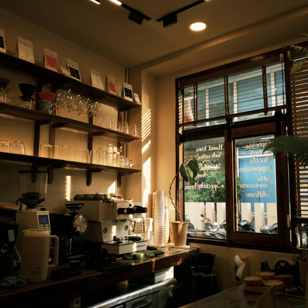 The café entrance with outdoor seating