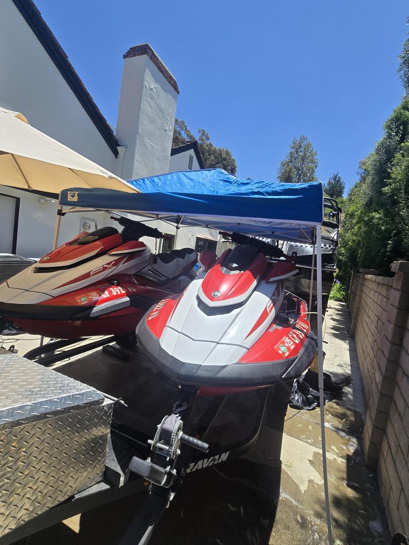 Jet ski being machine-polished during a mobile detail