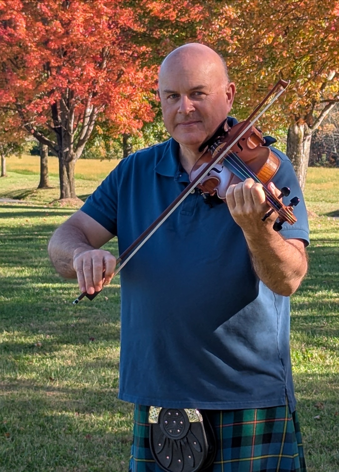 Colin MacLeod playing fiddle in Highland dress, Highland County, Virginia