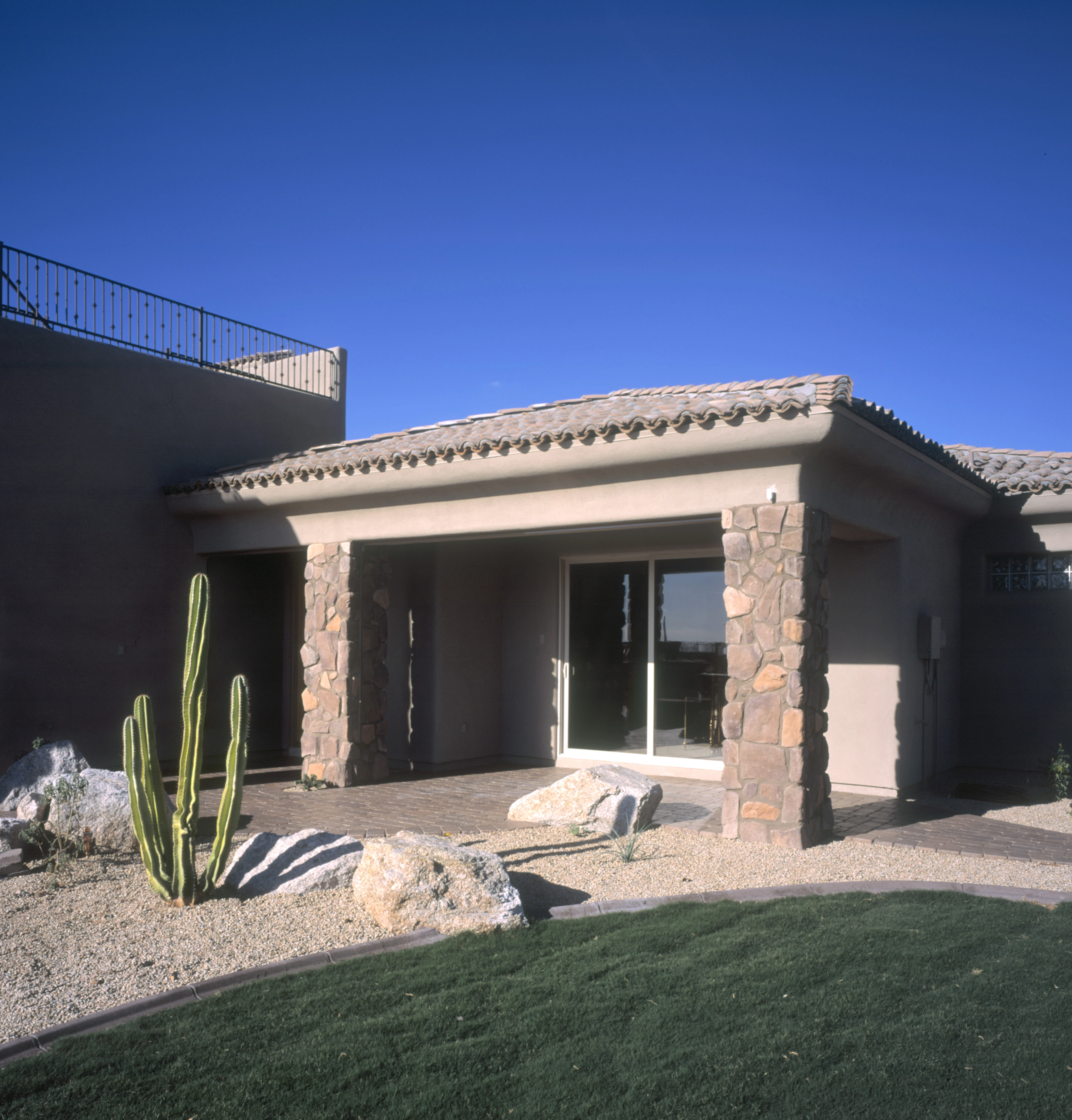 Before — exposed patio area