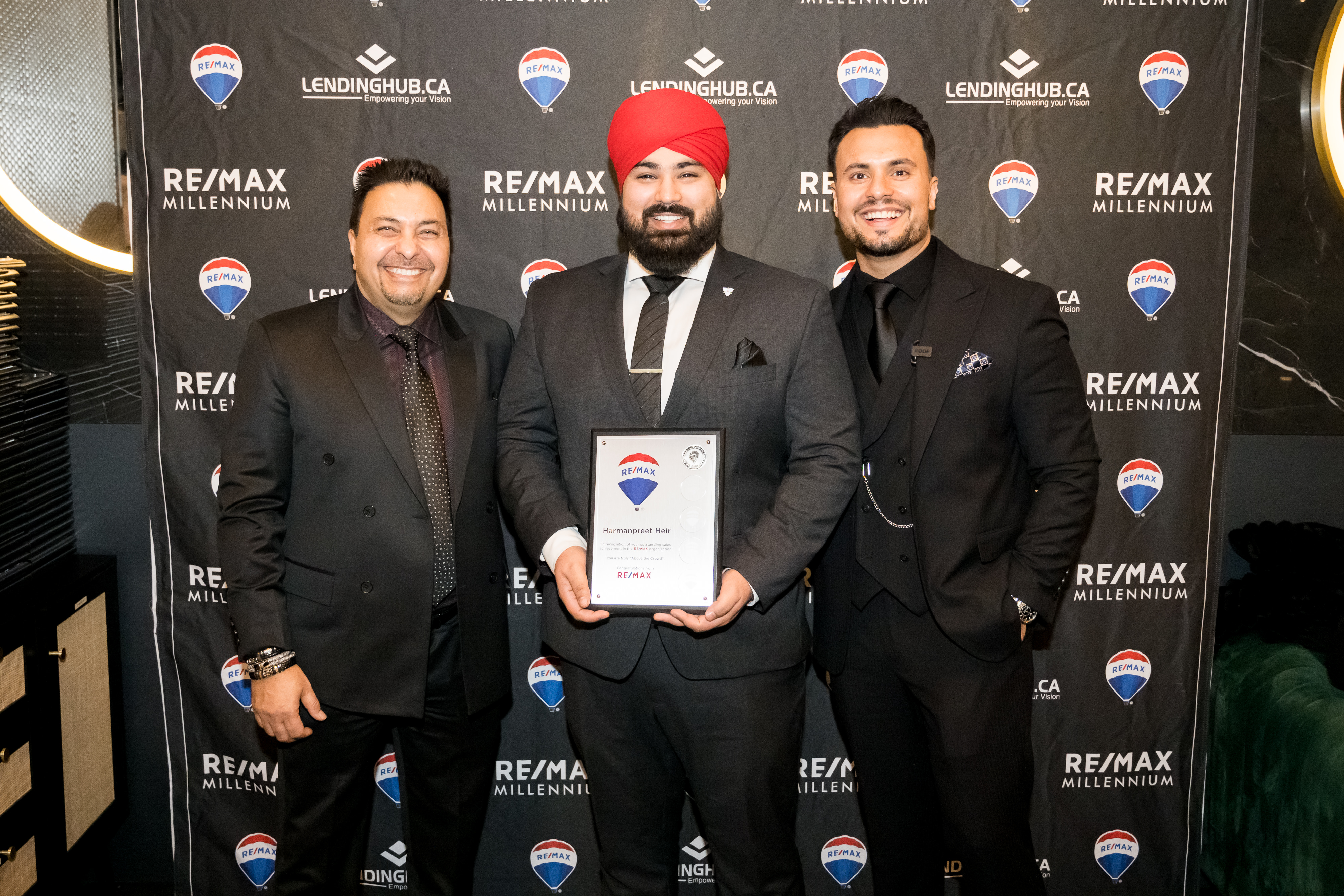 Harman with RE/MAX award