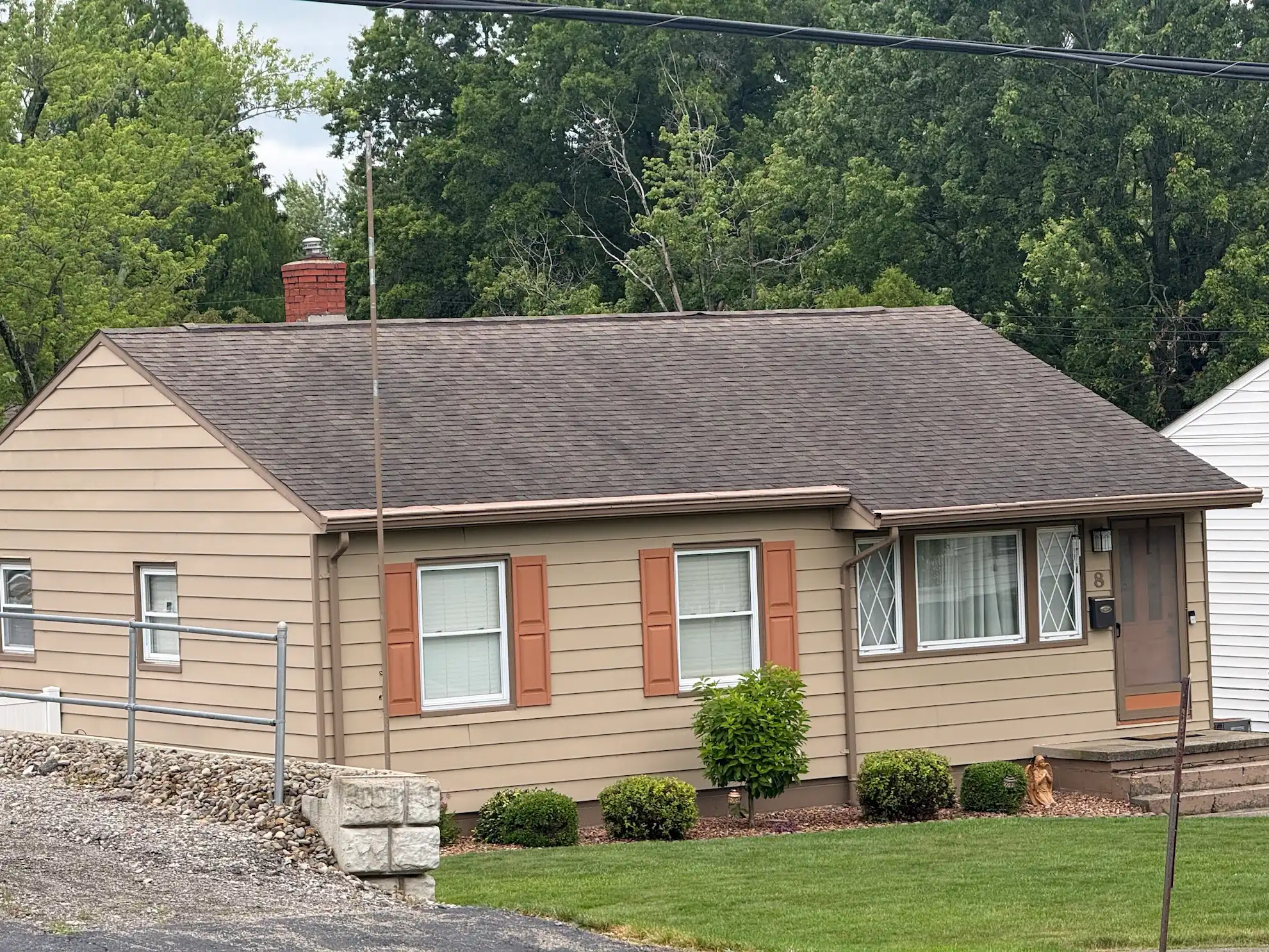 Completed hip roof replacement with architectural shingles in Niles, Ohio