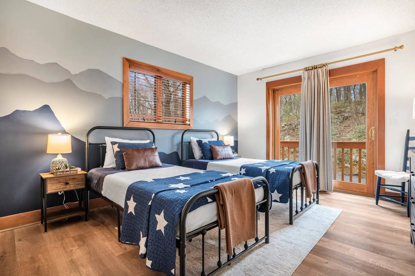 Bedroom with mountain mural