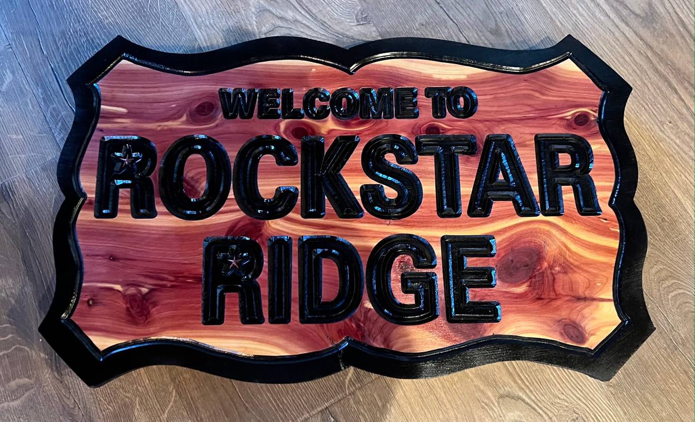 Firewood and Rockstar Ridge sign