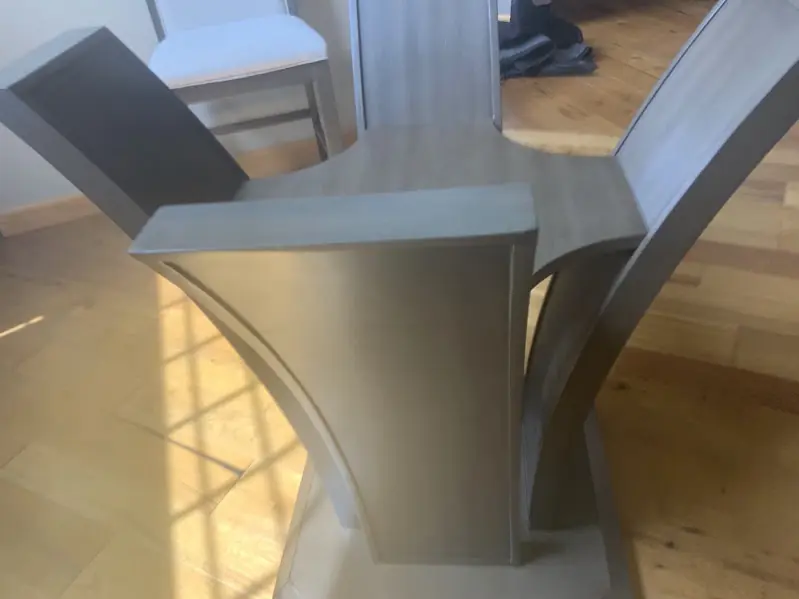 After photo of the same table base with the corner rebuilt and refinished to blend in.