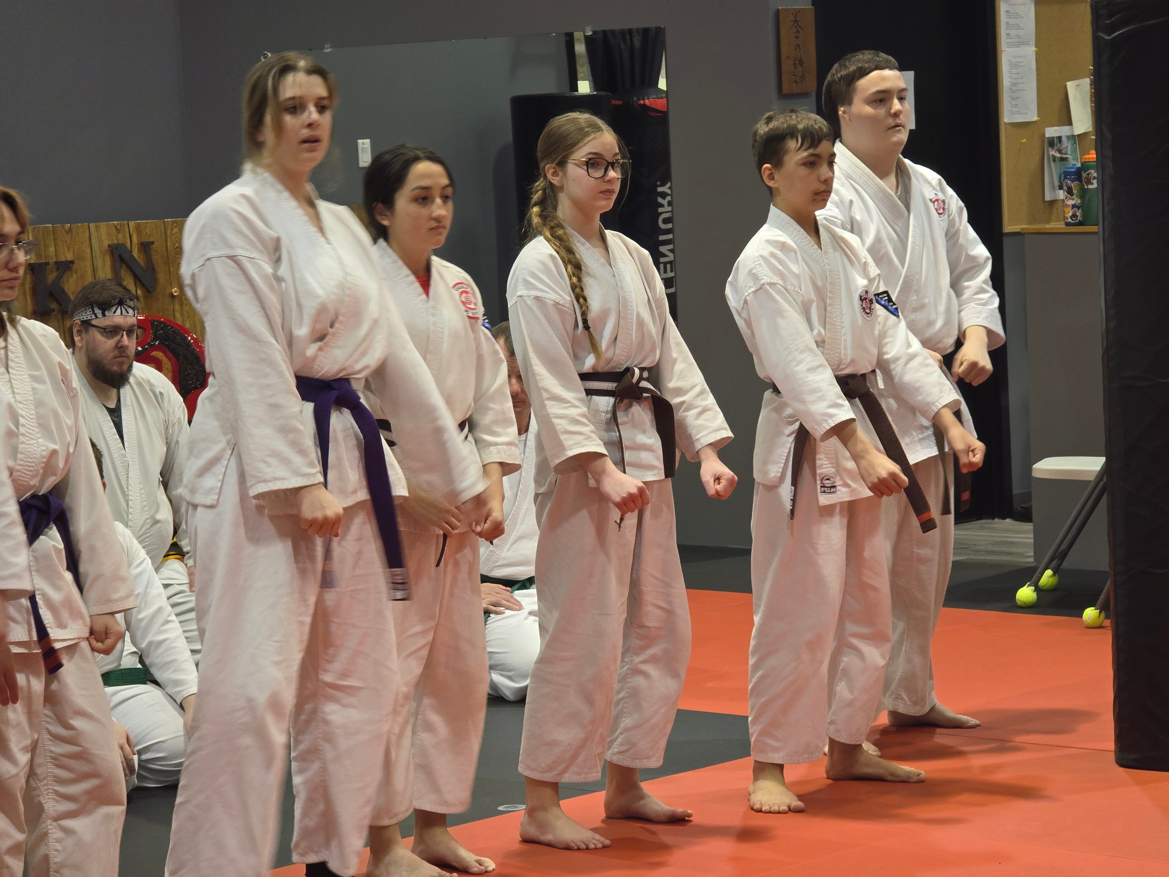 Teen and youth students training in a traditional karate class at KNS Martial Arts n London, Ontario
