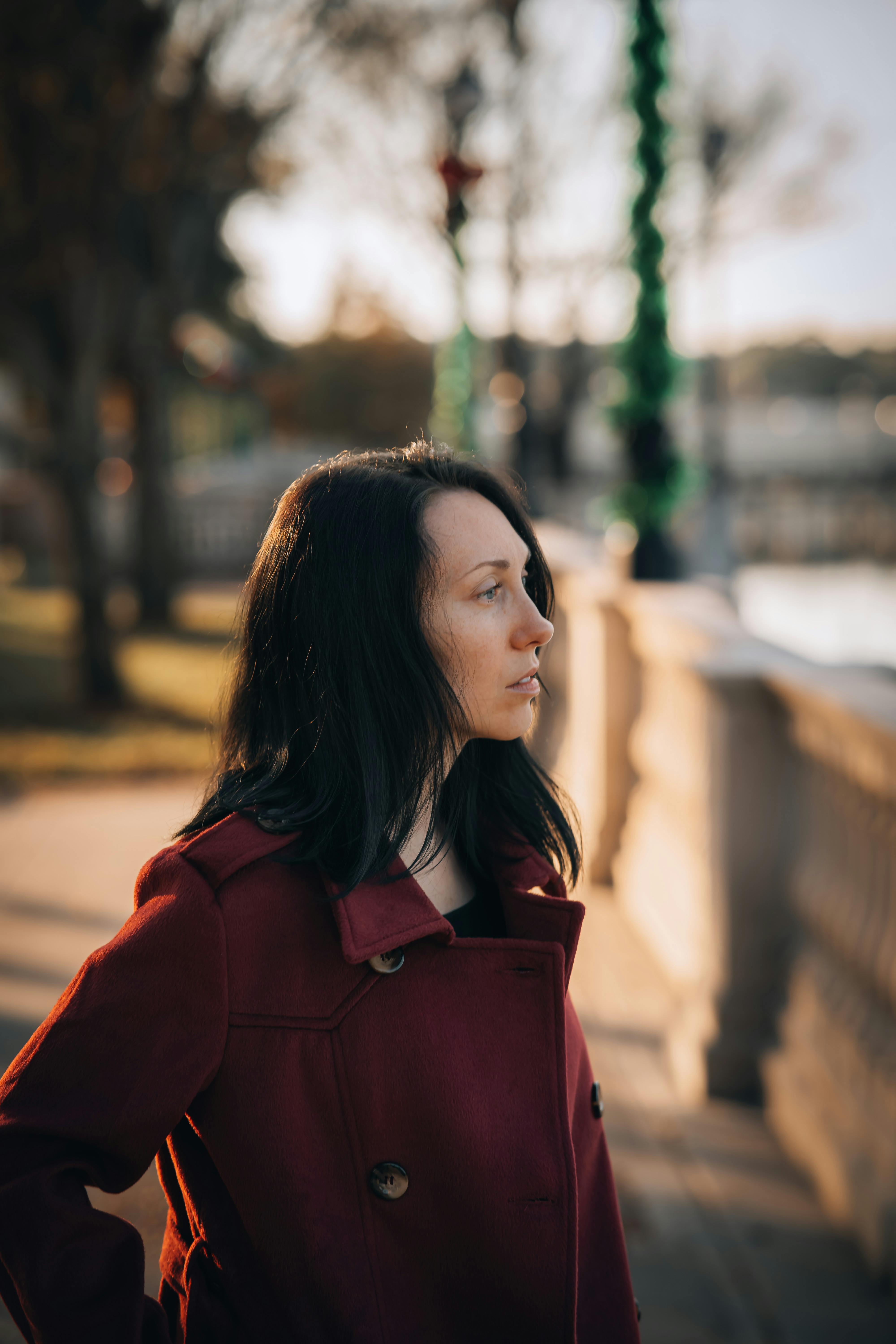 Confident midlife woman in natural light representing the quiet authority that comes from sharing your lived experience honestly with the women you are here to serve. Confident midlife woman in natural light representing the quiet authority that comes from sharing your lived experience honestly with the women you are here to serve.