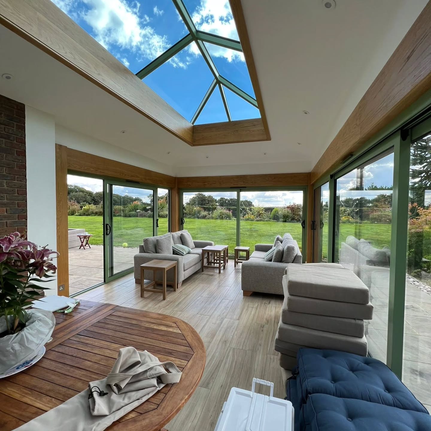 A garden-room extension with lantern roof and bifold doors built by Darby Building Solutions