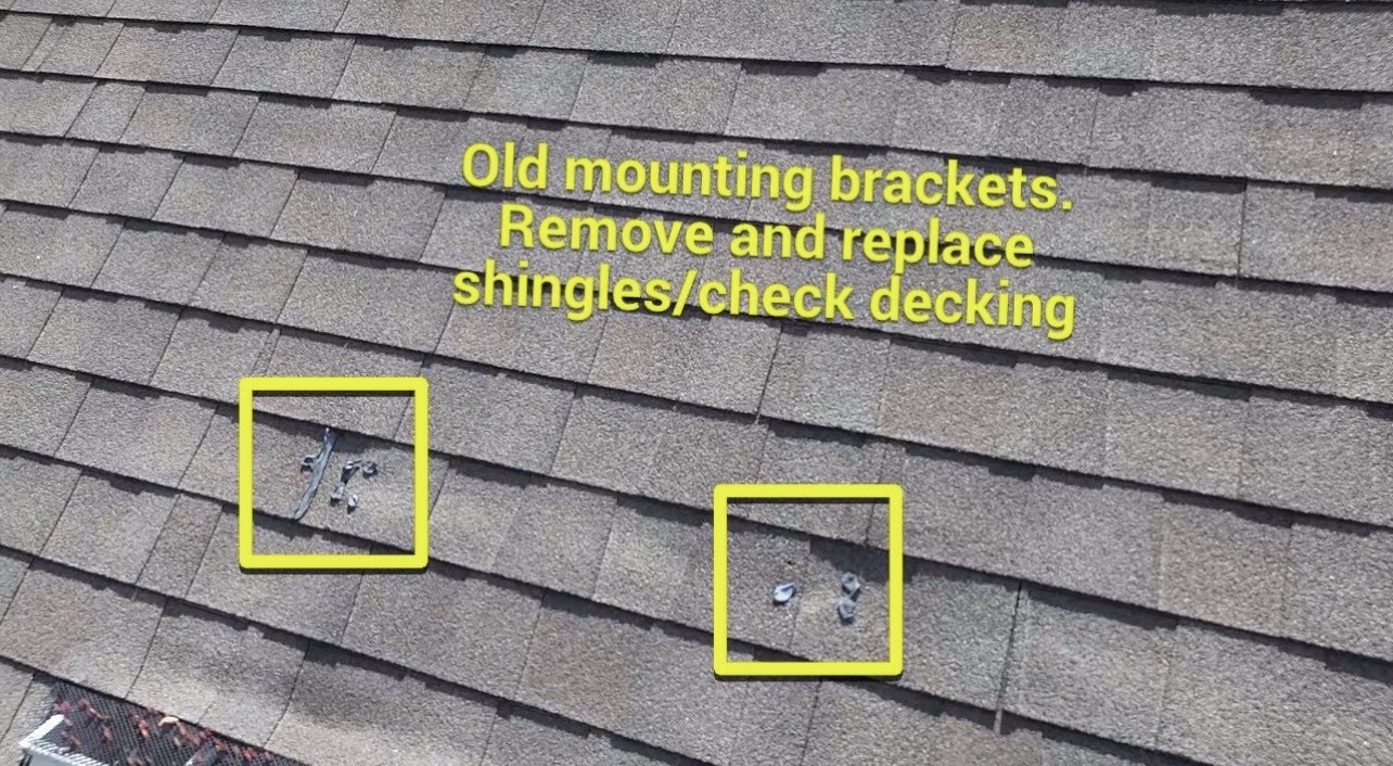 Mounting brackets removed and caulked requiring shingle replacement