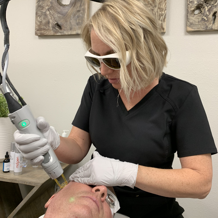 Shannon Evans, RN performing a laser treatment at Desert Sands Aesthetics & Laser, St. George Utah