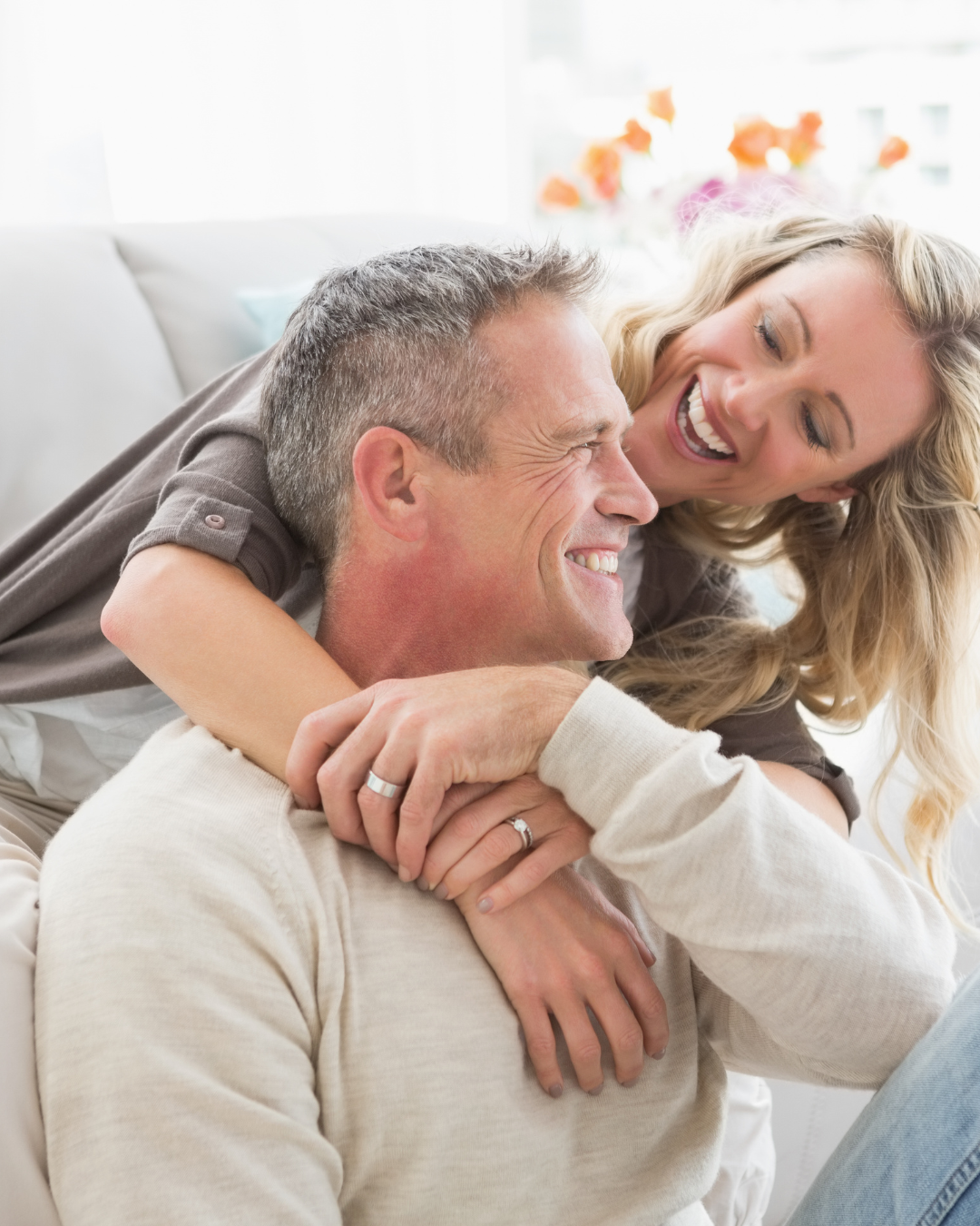 A happy couple enjoying renewed emotional balance after EXOMIND therapy