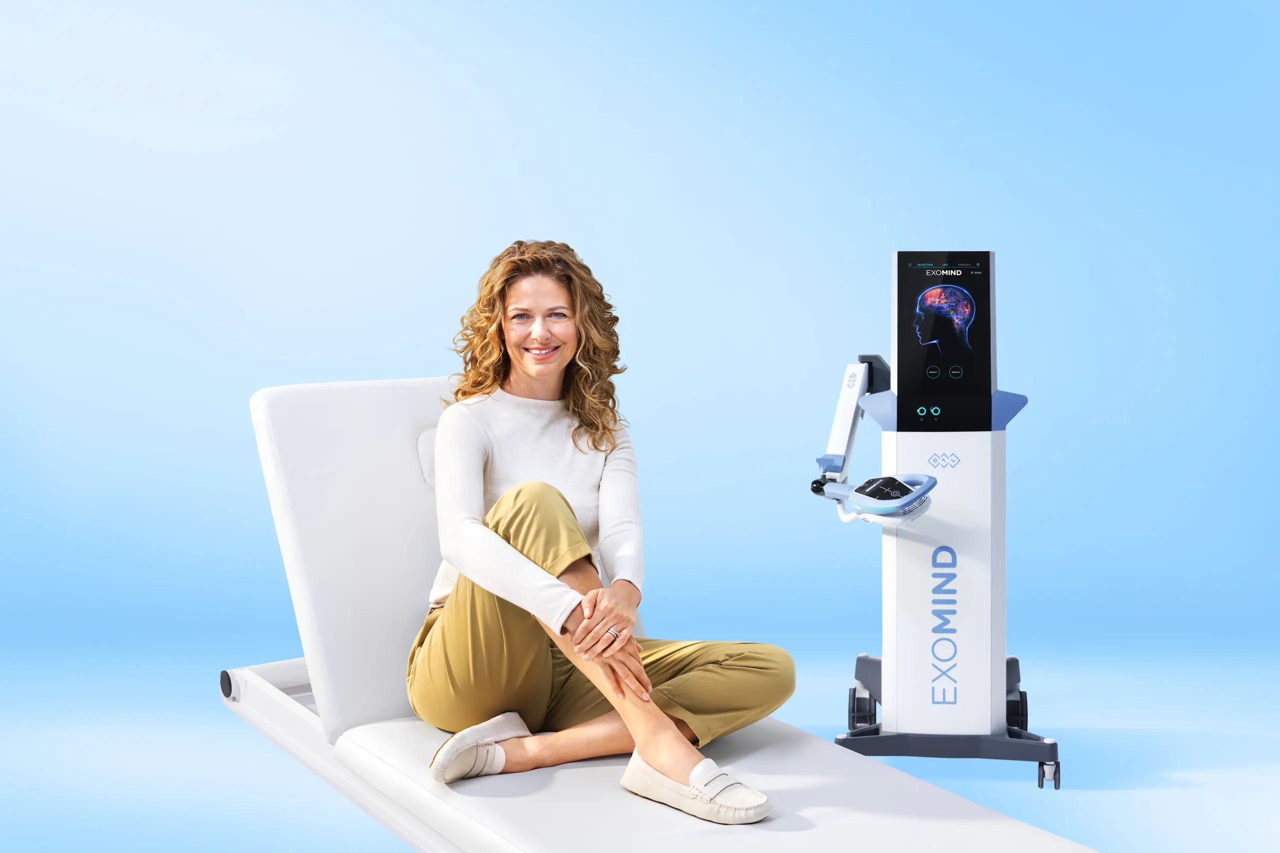 A patient comfortably receiving EXOMIND brain-stimulation therapy at Desert Sands Aesthetics & Laser in St. George, Utah