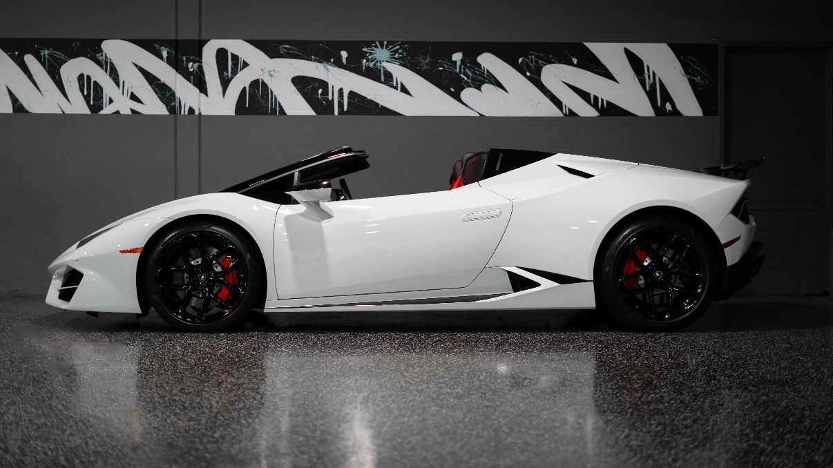White Lamborghini Huracan Spyder side