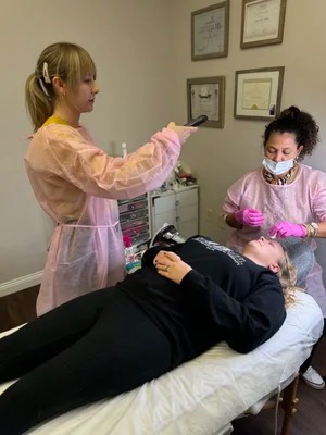 Lucia Santana working on a client