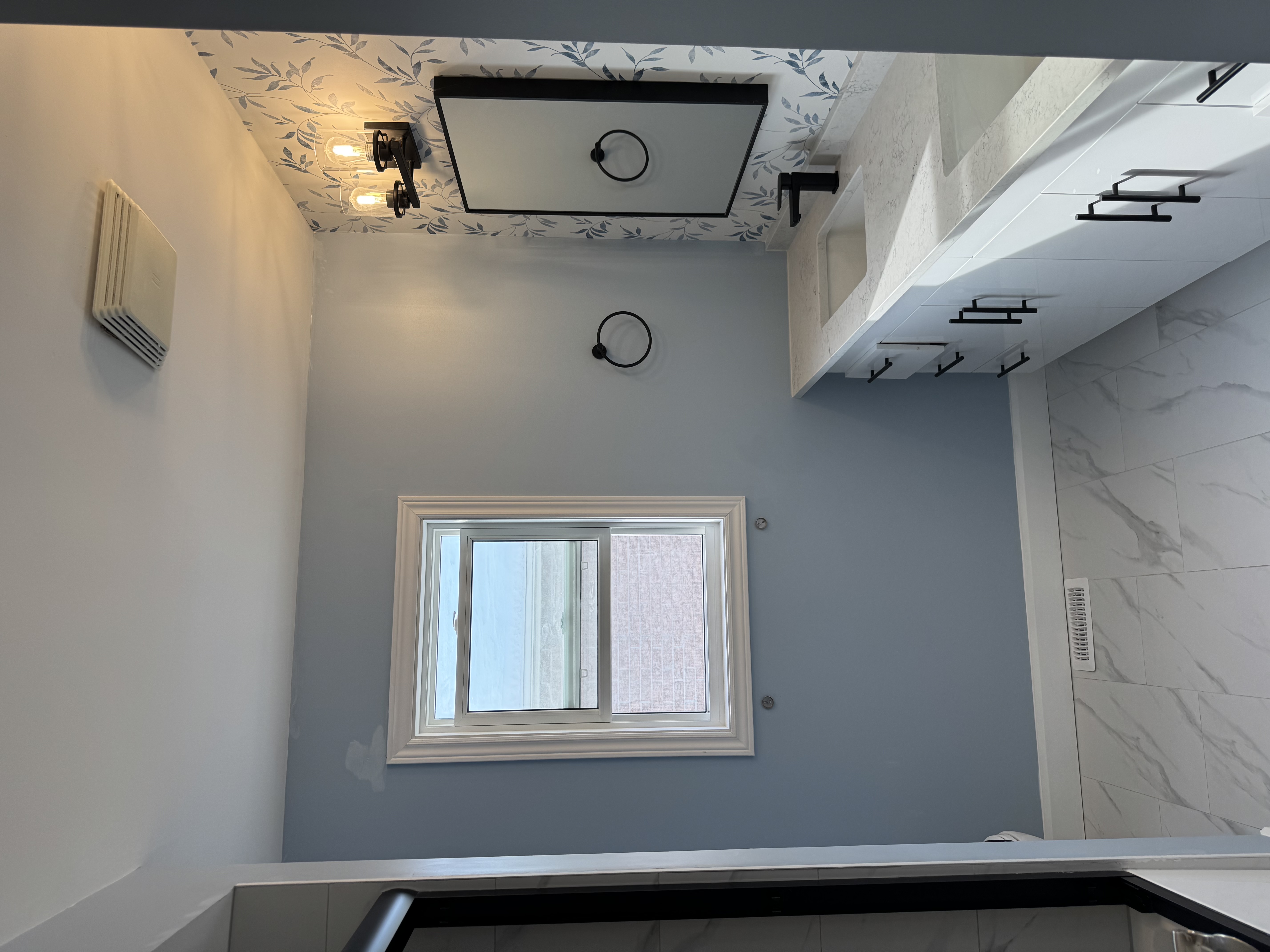 Blue painted bathroom interior by Premier Pro Painting in Waterloo Region
