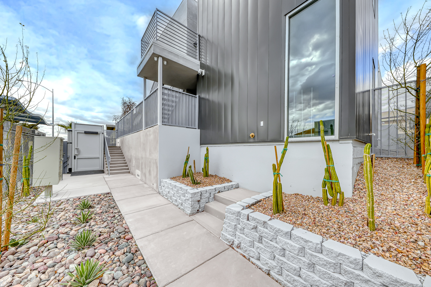 Building exterior with landscaped walkway