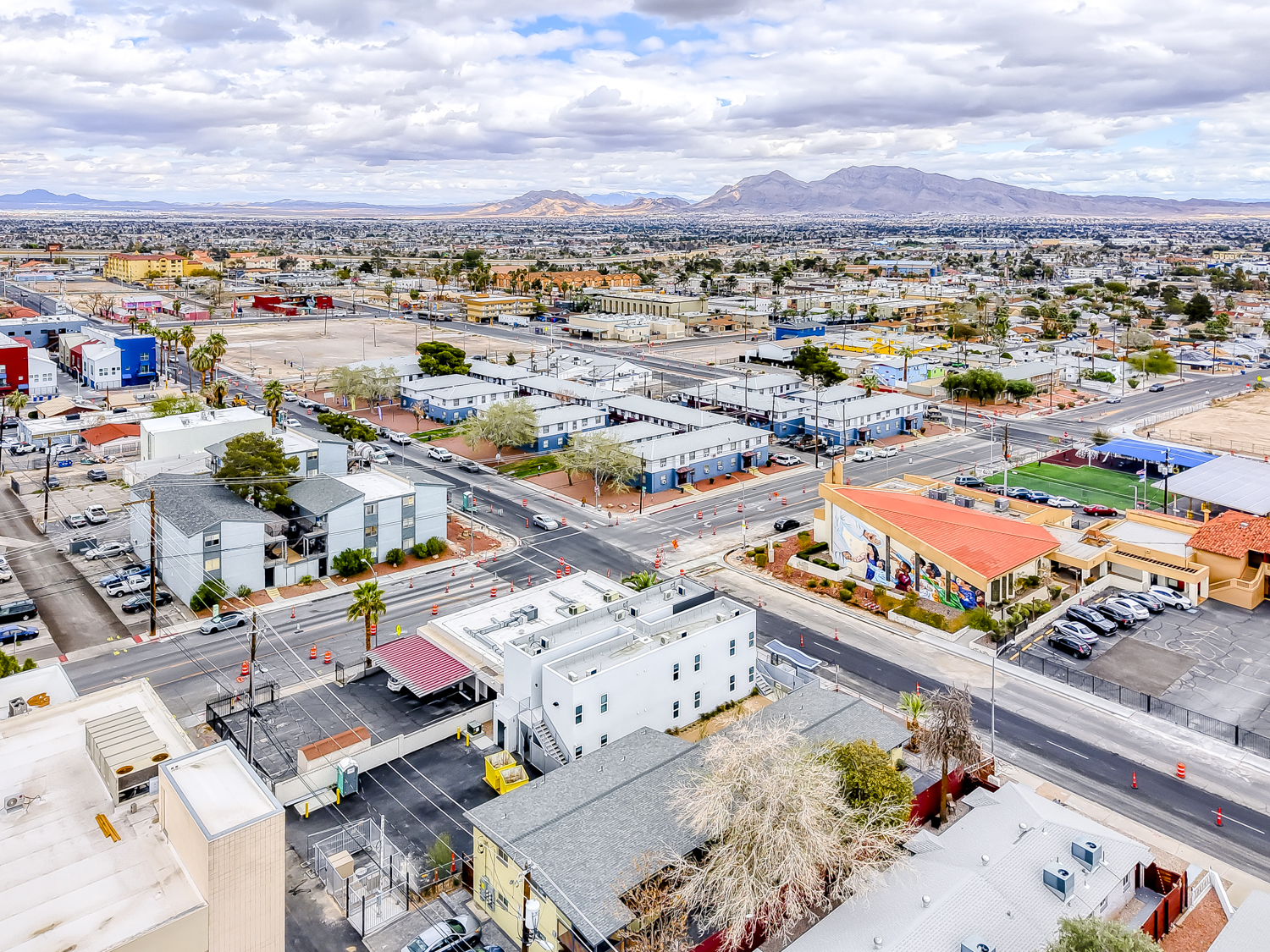 Aerial view of the surrounding neighborhood and mountains