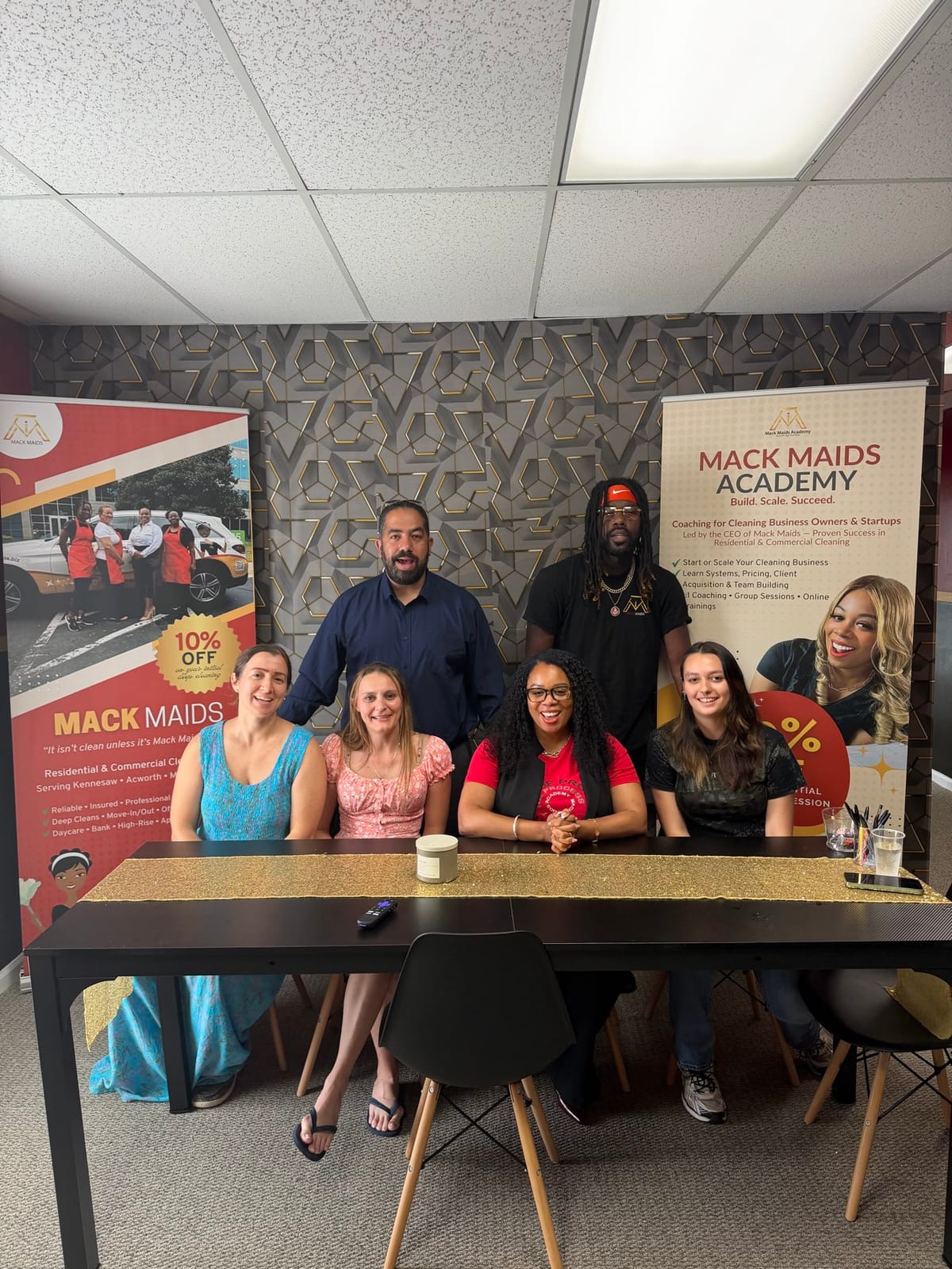 The Mack Maids team together at the Mack Maids office