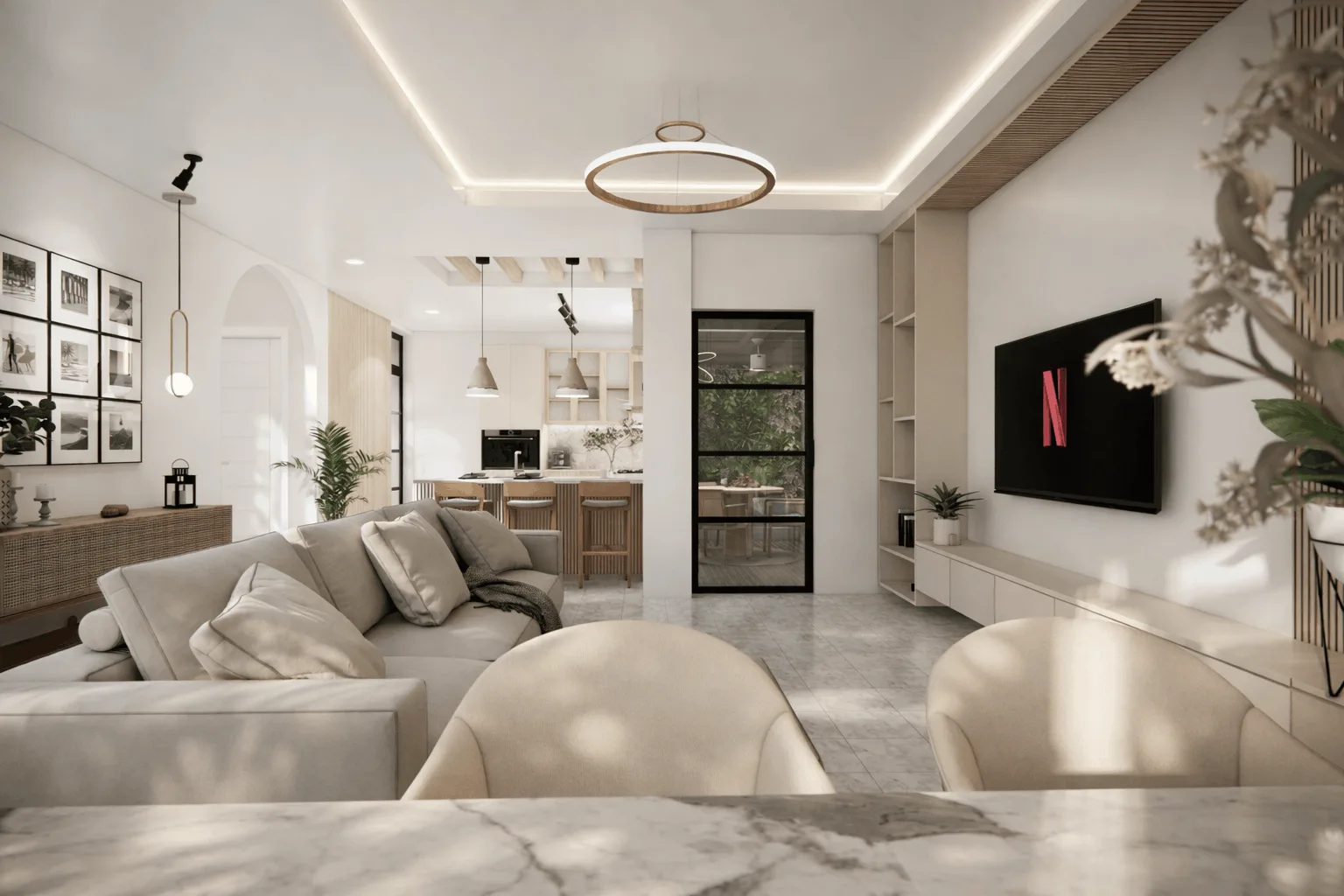 Open-plan living with gallery wall and arched doorways
