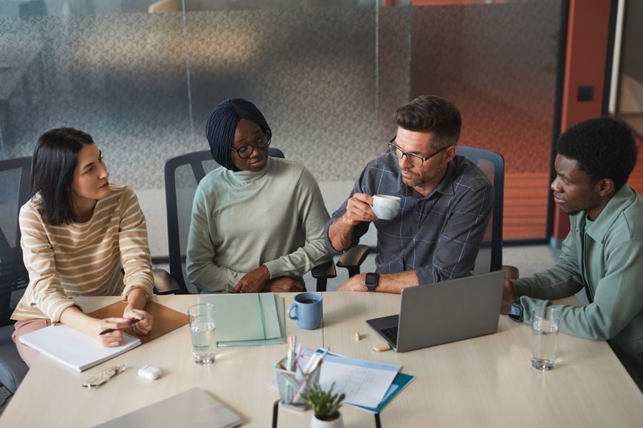 A team in conversation around a table