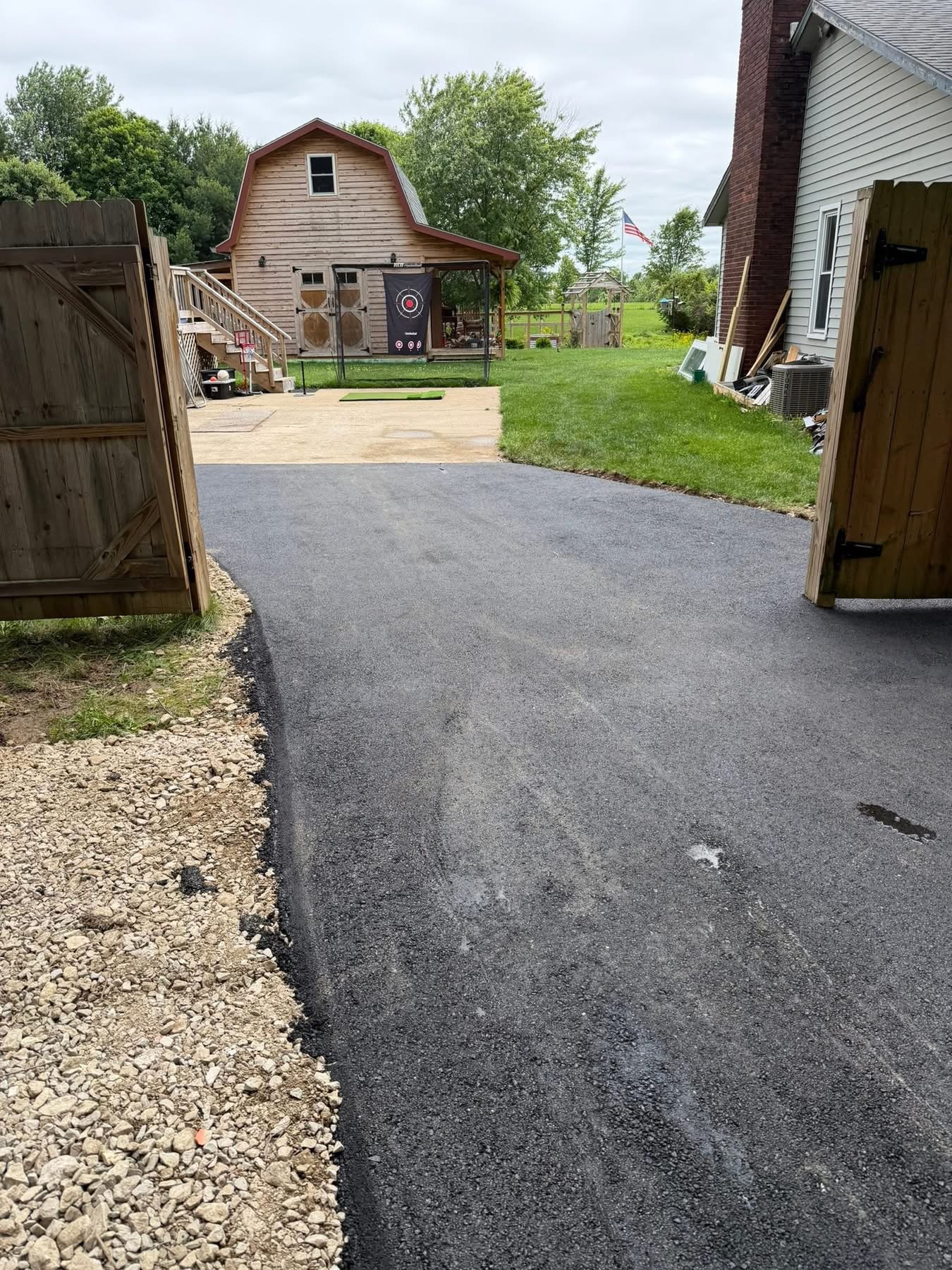 Newly finished asphalt surface by the Legacy Paving Co. crew