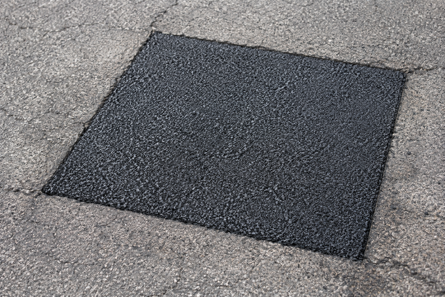 Permanent pothole repair with a hot asphalt patch in Saint Charles, MO