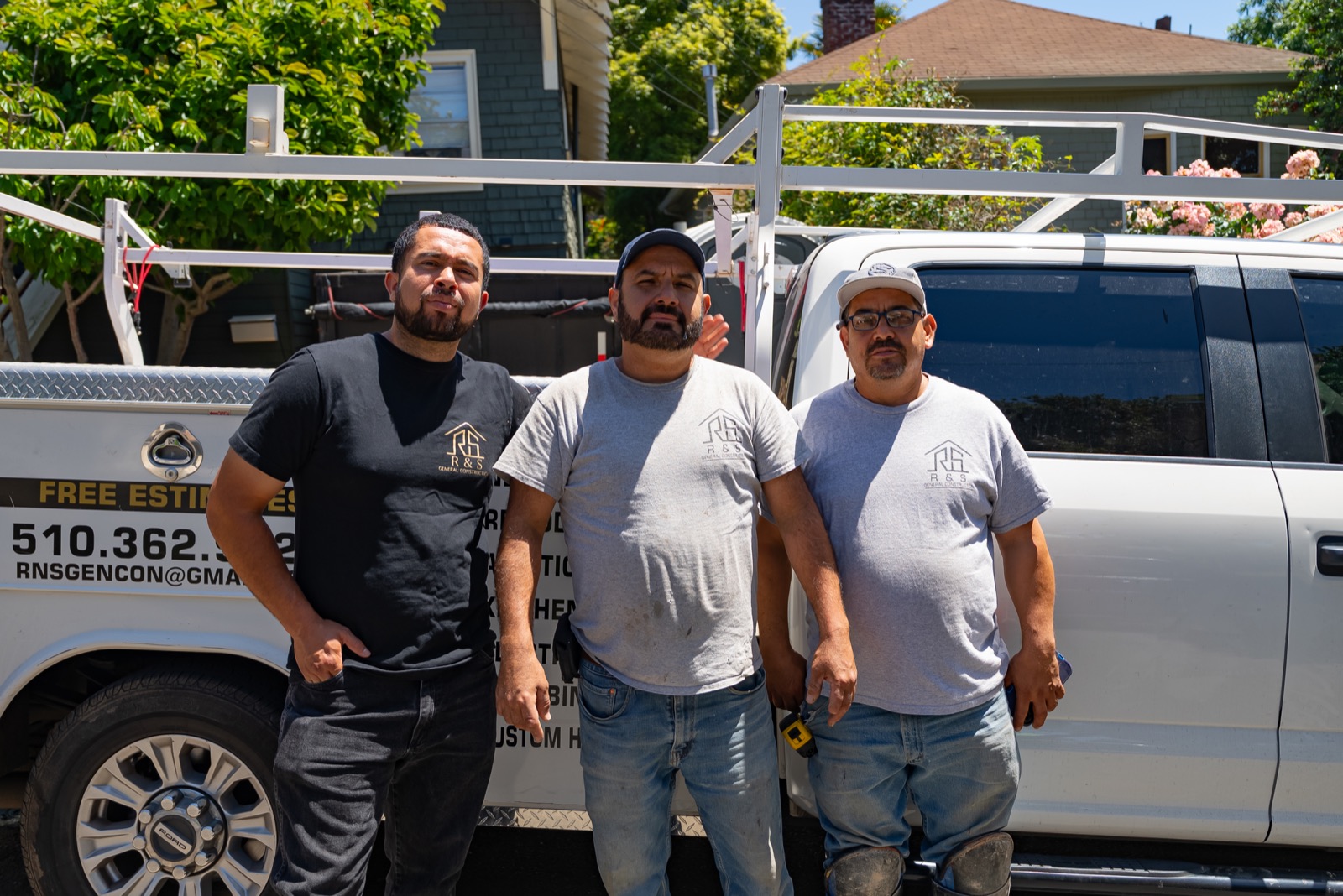R&S crew beside a work truck